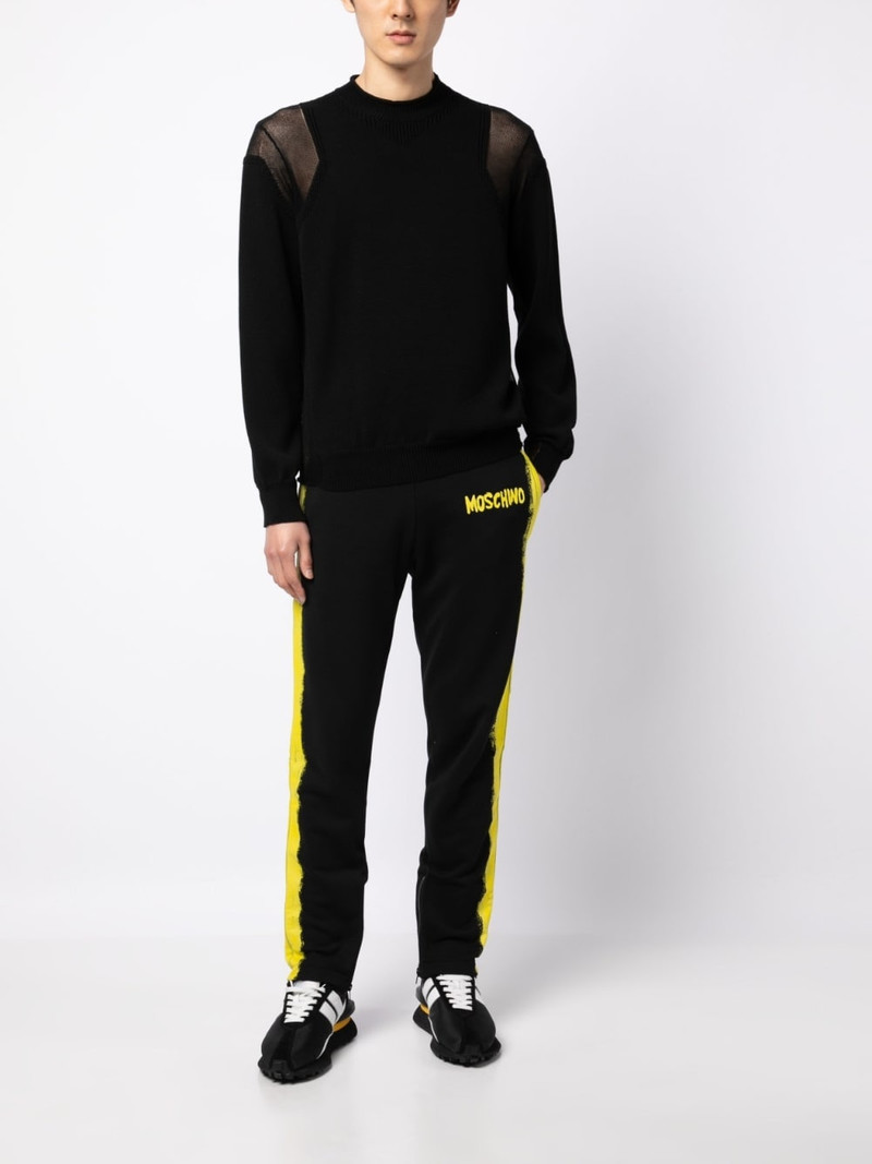 Moschino logo-print track pants outlook