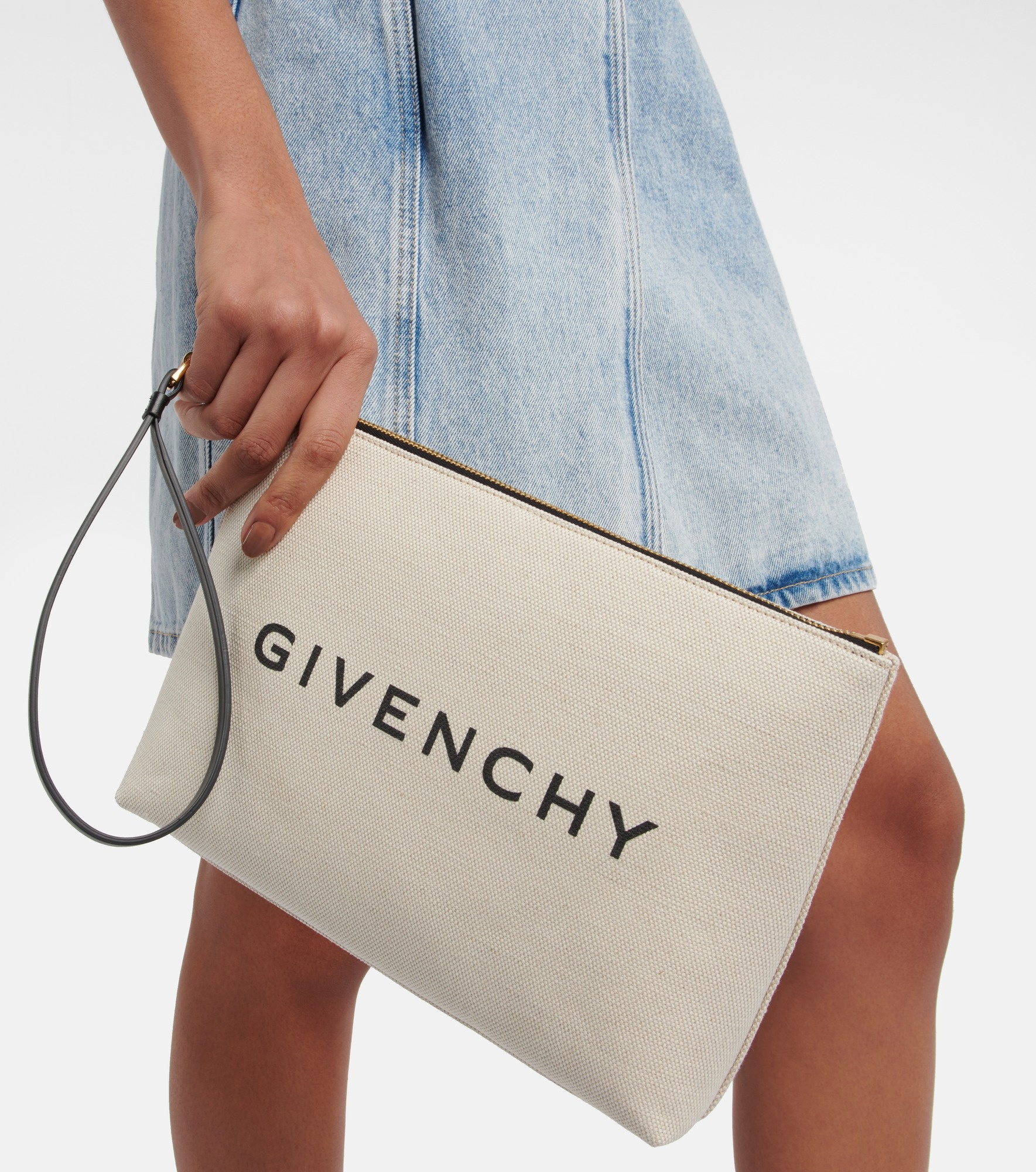 Givenchy Logo cotton-blend canvas clutch mytheresa REVERSIBLE