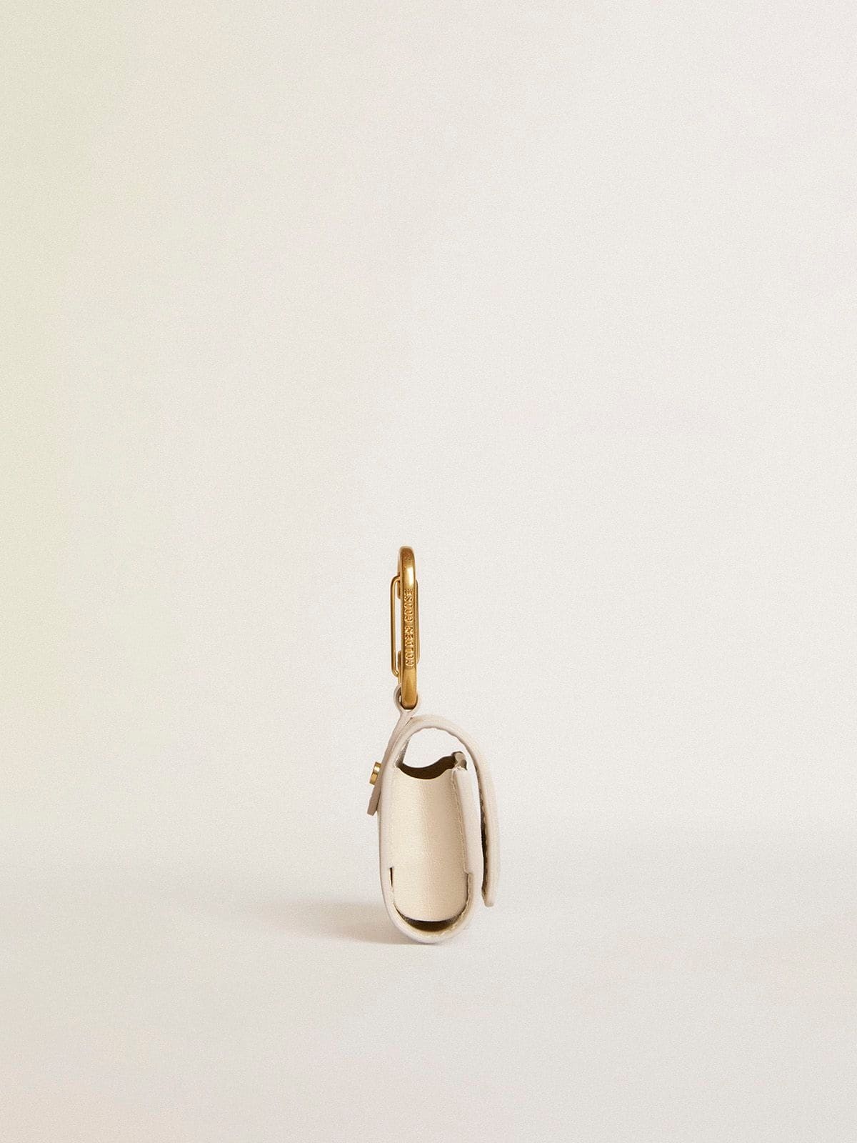 Worn white AirPod case - 3