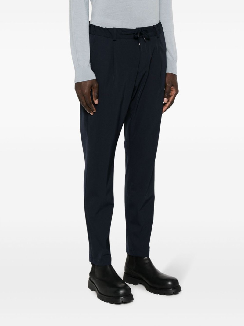 logo-plaque button-fastening tapered trousers 3