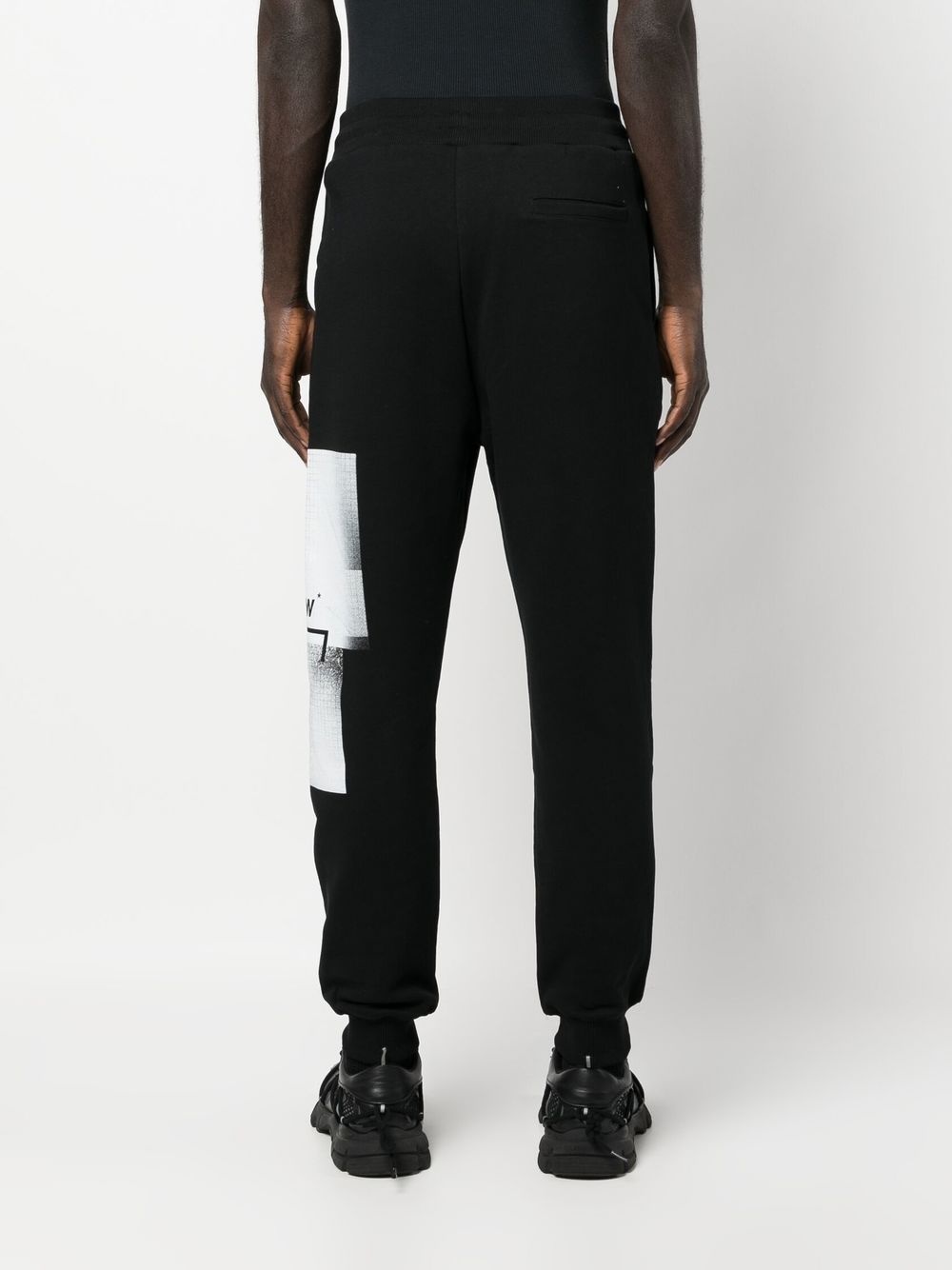 Brutalist logo-print track pants - 4