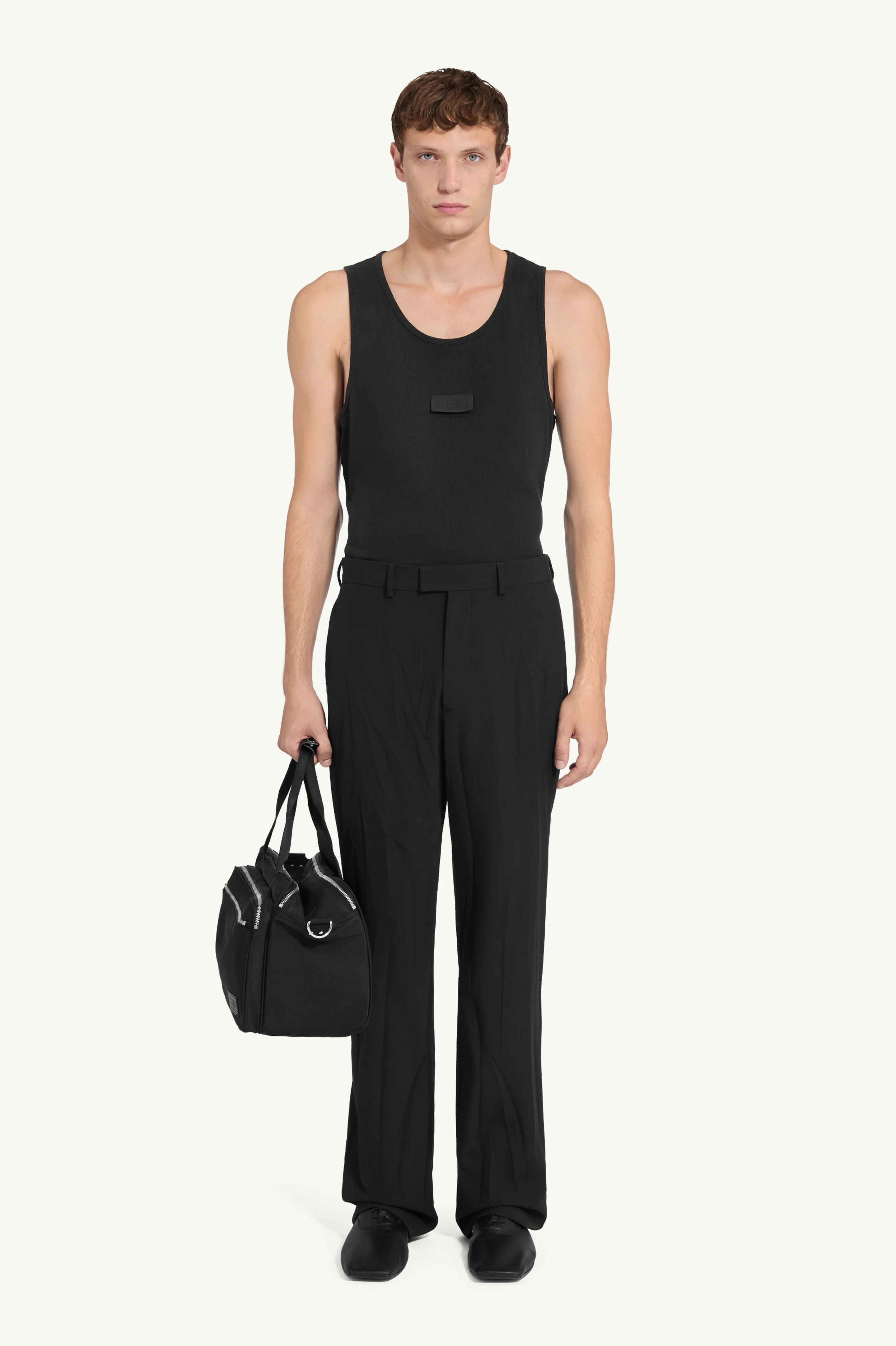 Creased wool-blend trousers - 1