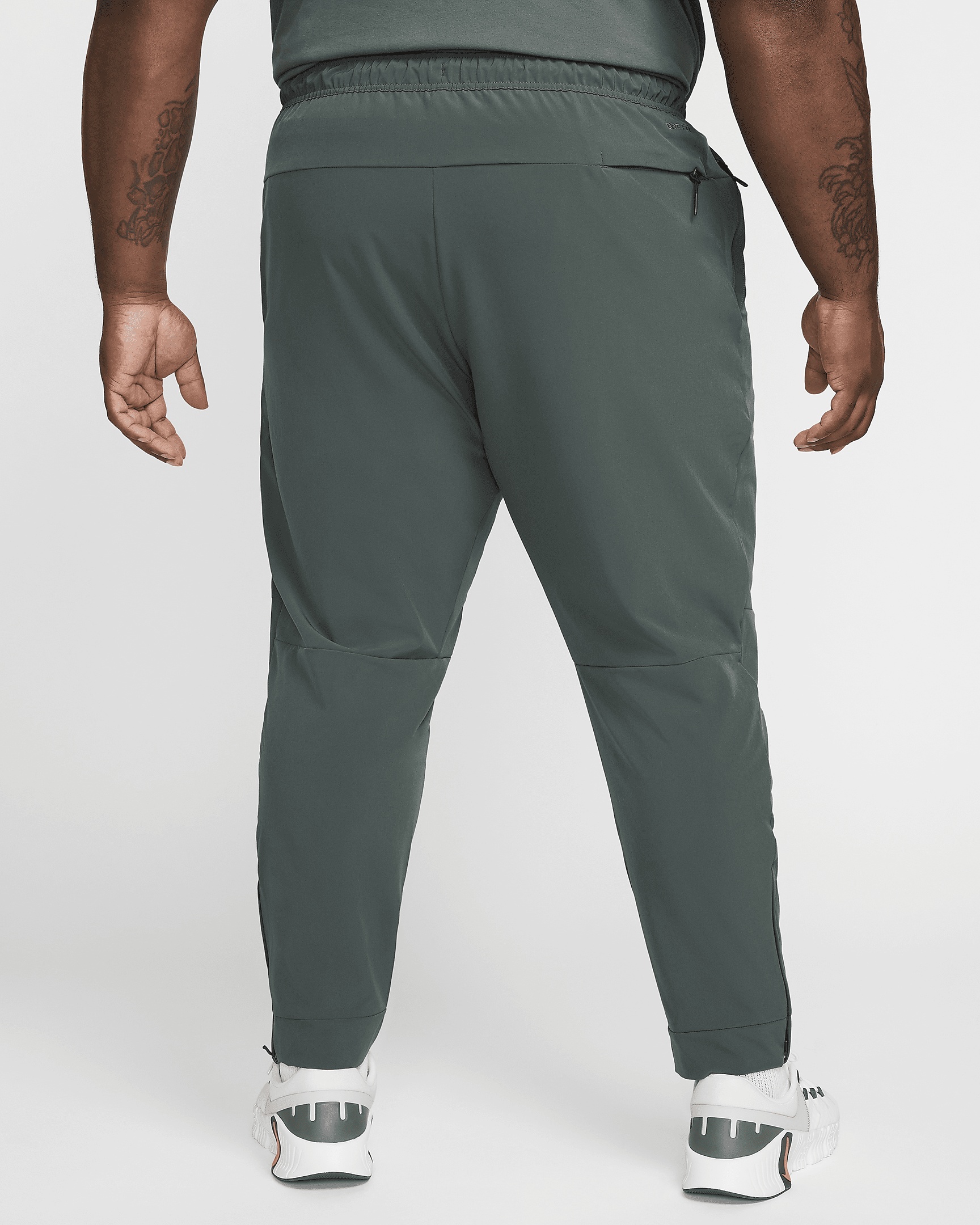 Nike Unlimited Men's Dri-FIT Zippered Cuff Versatile Pants - 10