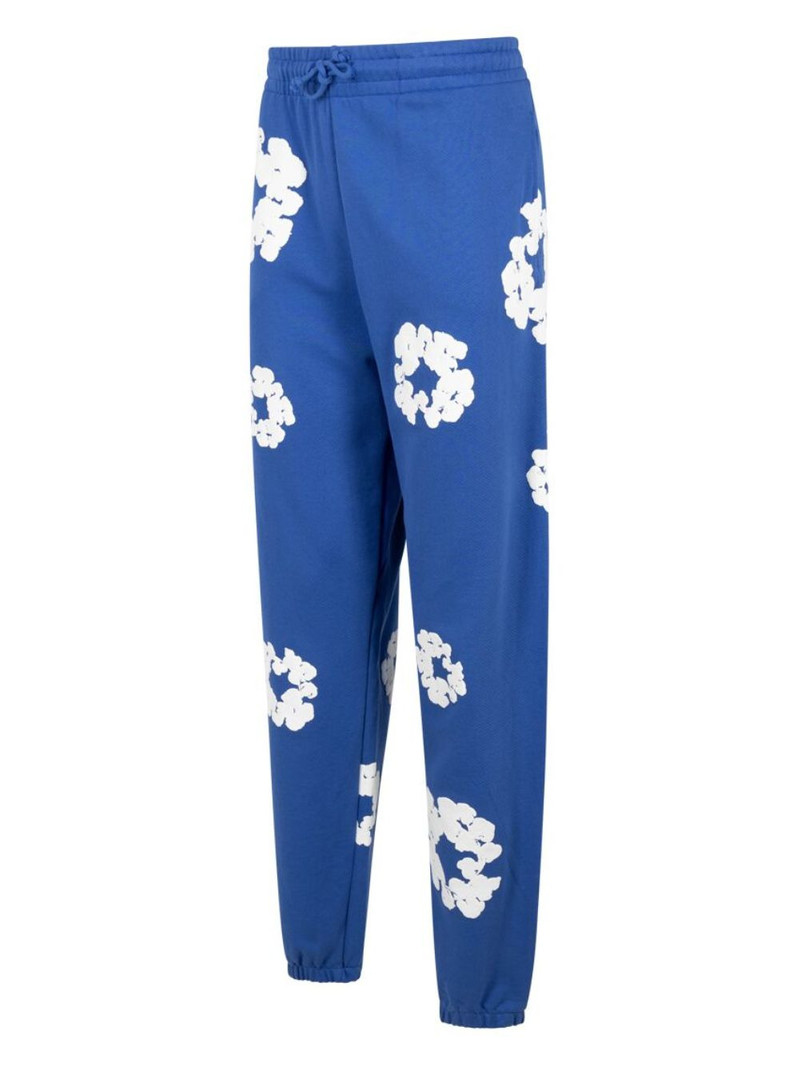 DENIM TEARS wreath-print track pants outlook
