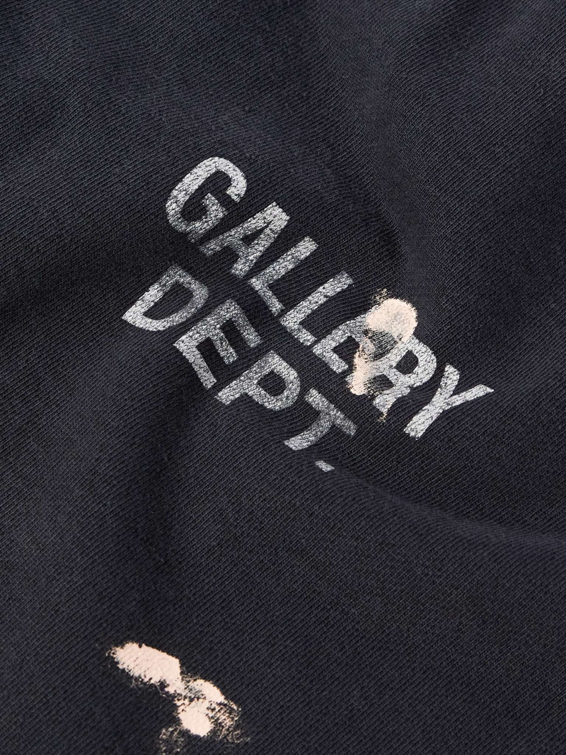 Flared Paint-Splattered Panelled Logo-Print Cotton-Jersey Sweatpants 5