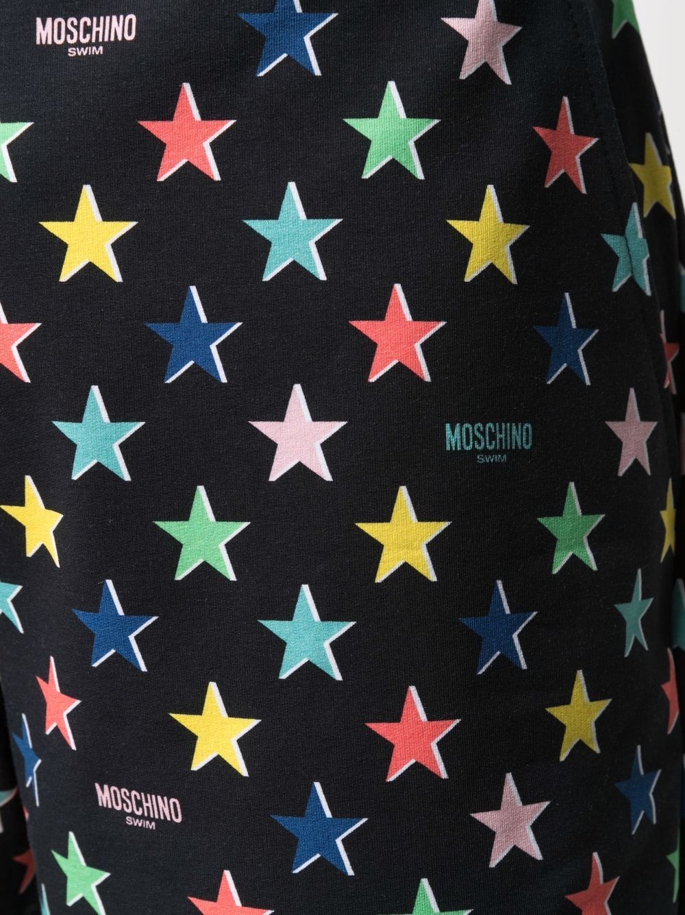 layered star-print trousers - 7