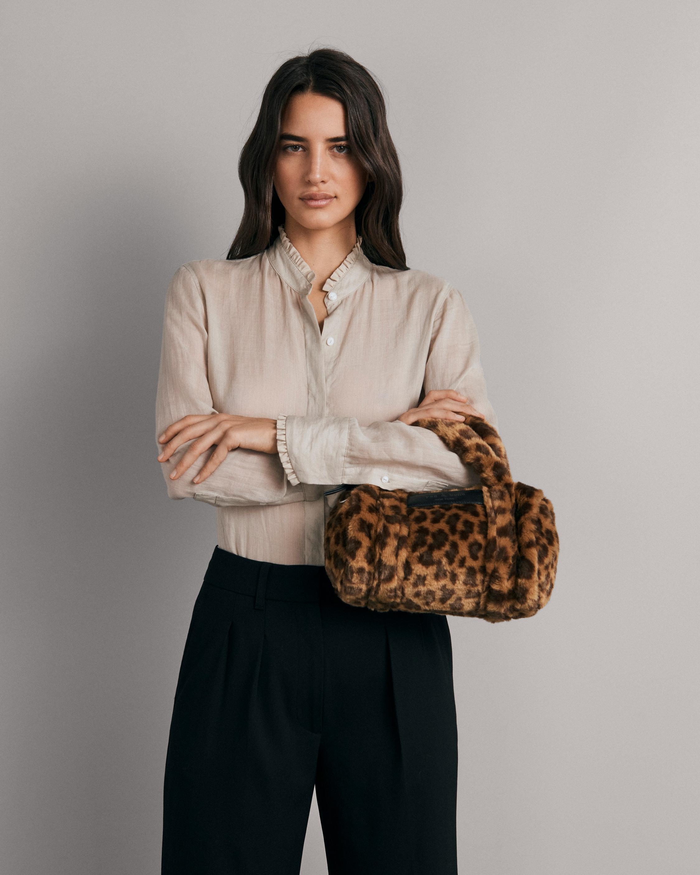 Cloud Duffle - Faux Fur
Mini Duffle Bag - 2