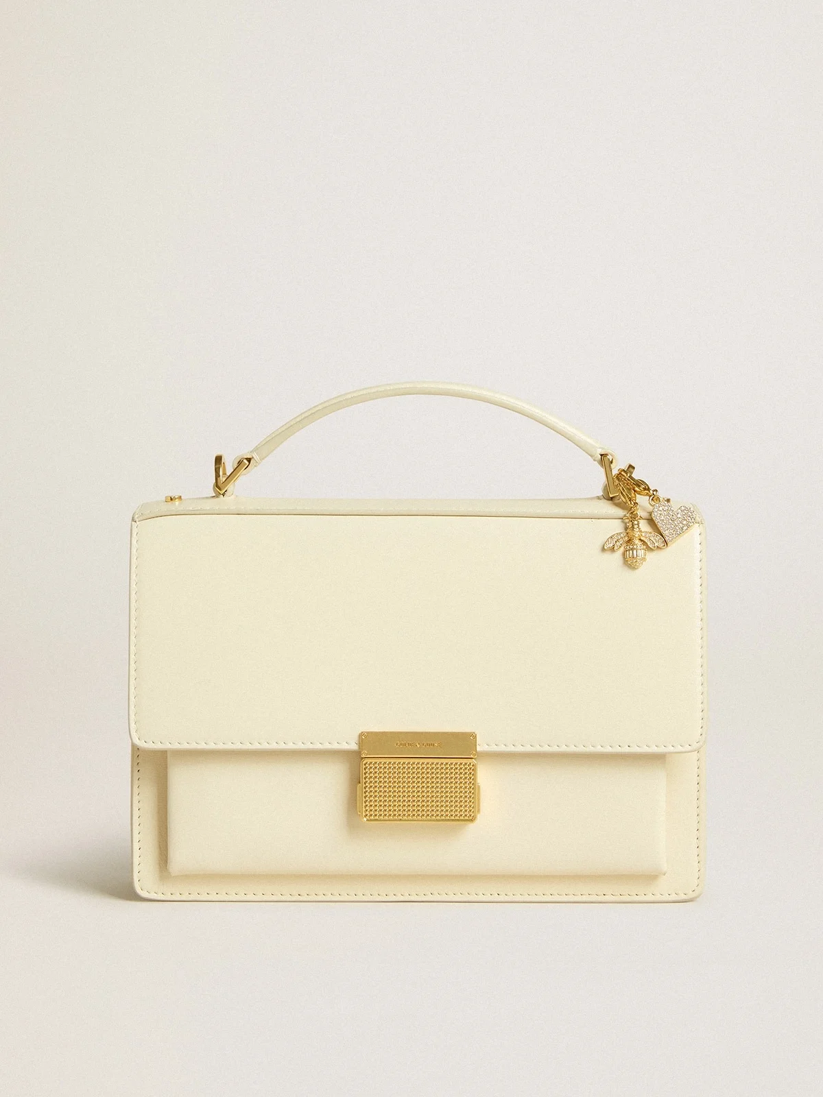 Venezia Bag in butter-colored boarded leather with double charm - 1