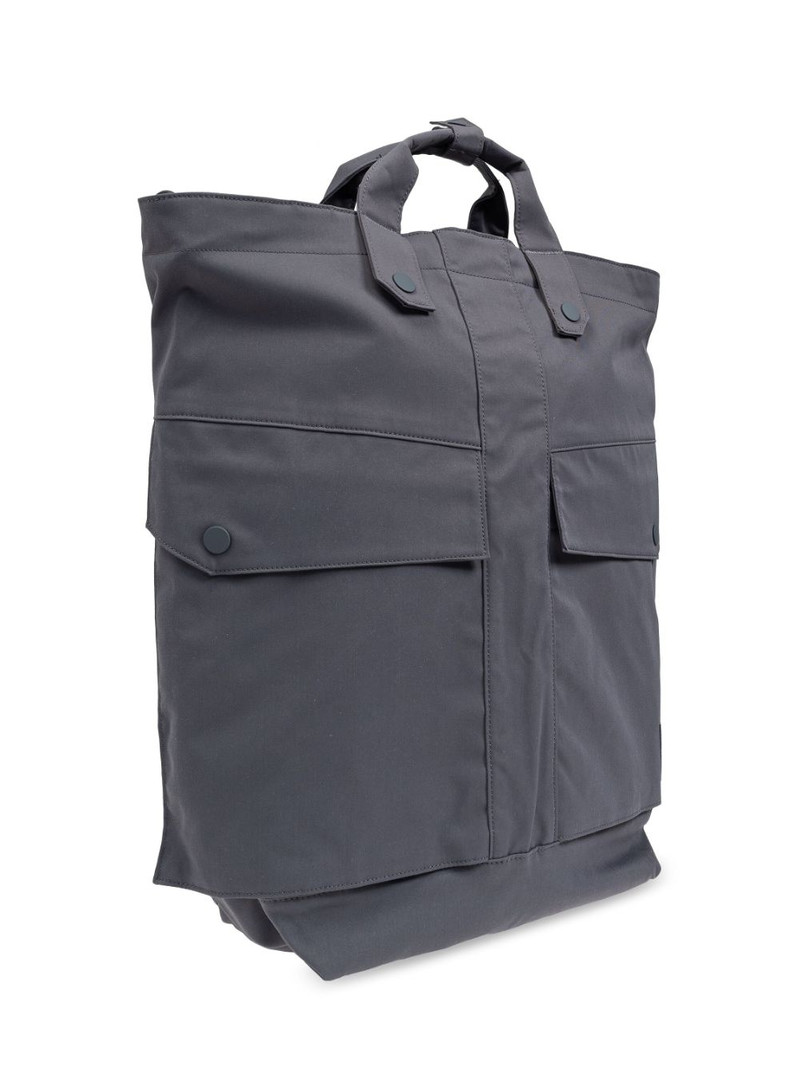 flap-pocketed bagpack 4