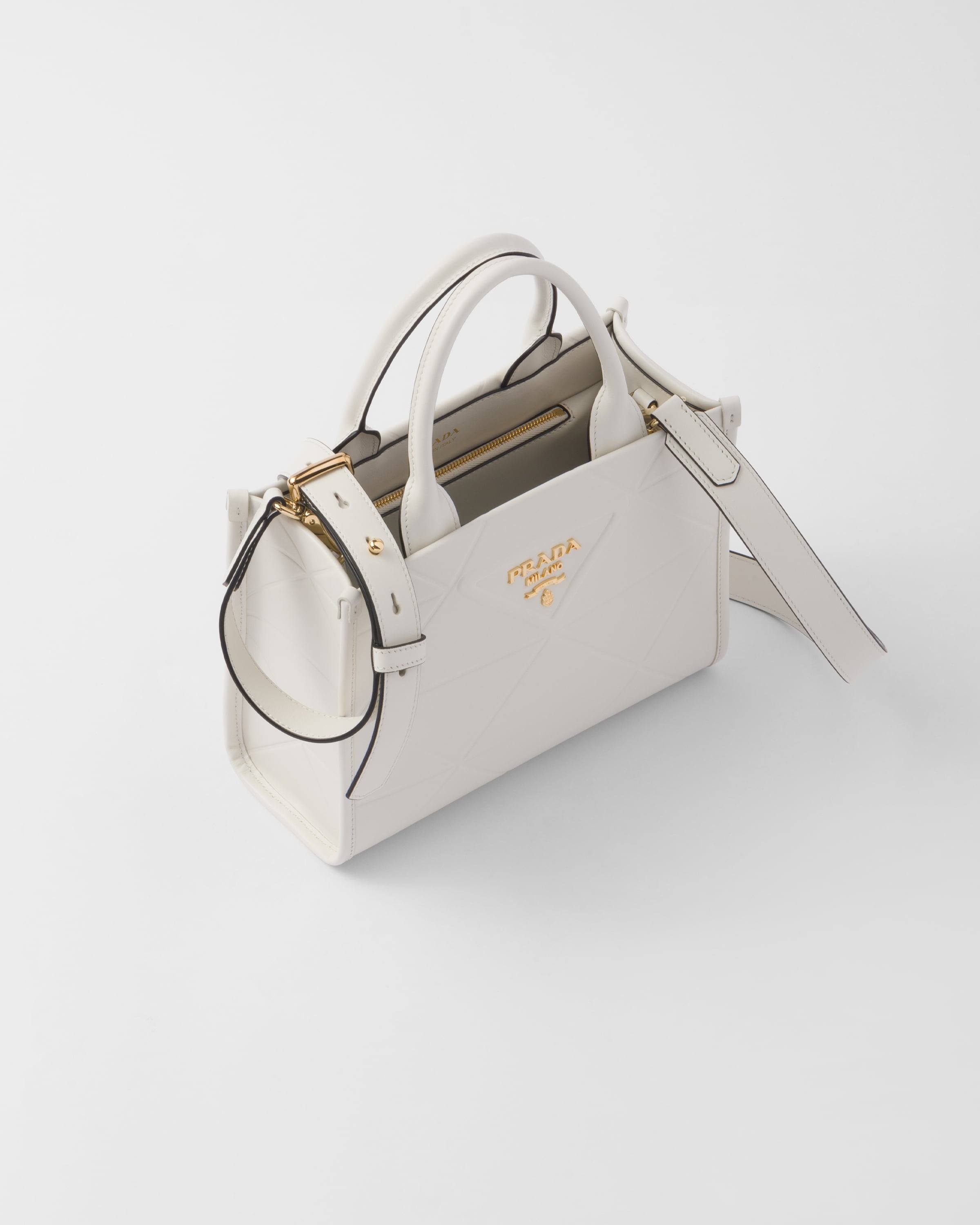 Prada Shearling And Saffiano Leather Mini-pouch in White