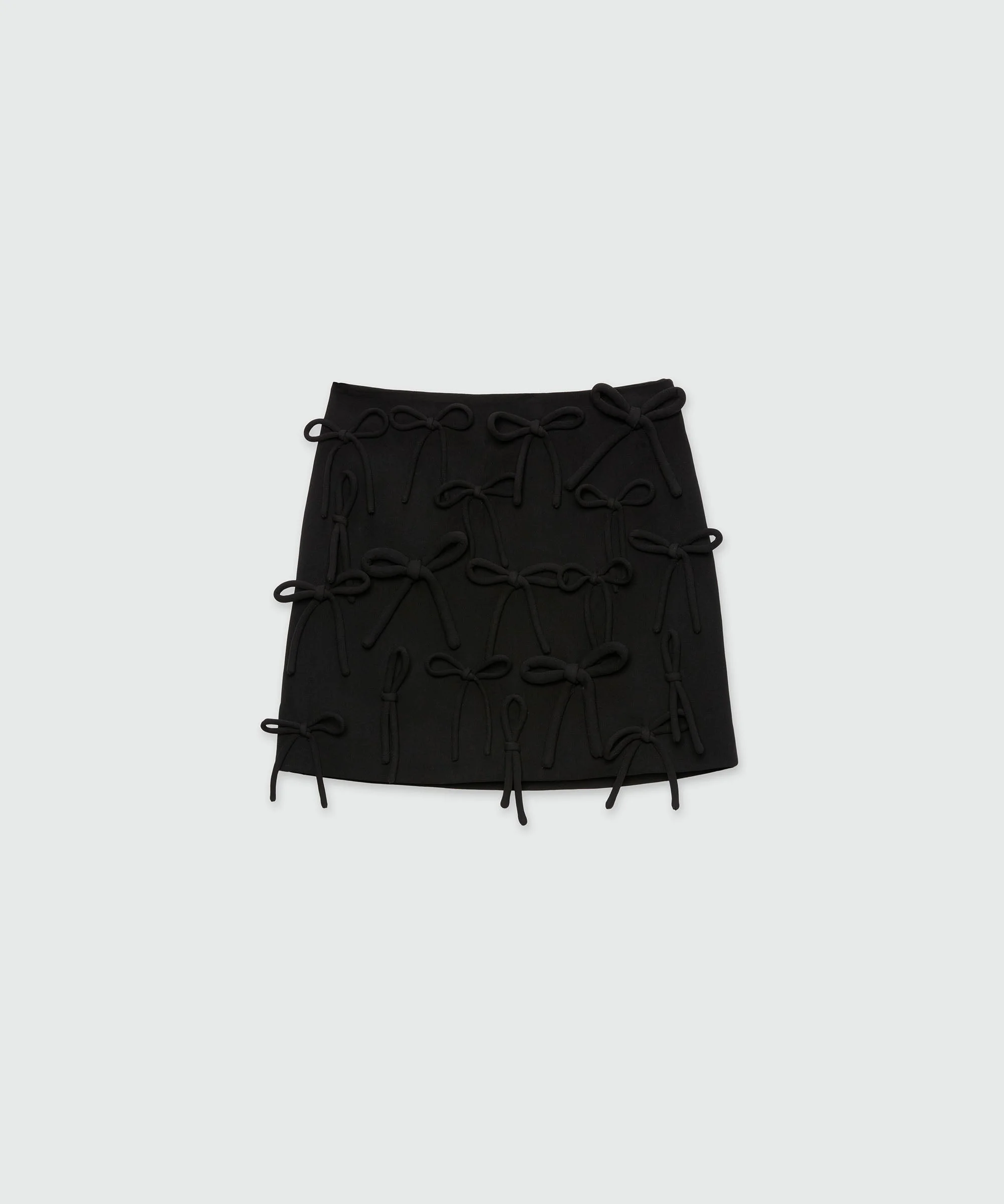 Black miniskirt in double crepe cady with bow detail - 1