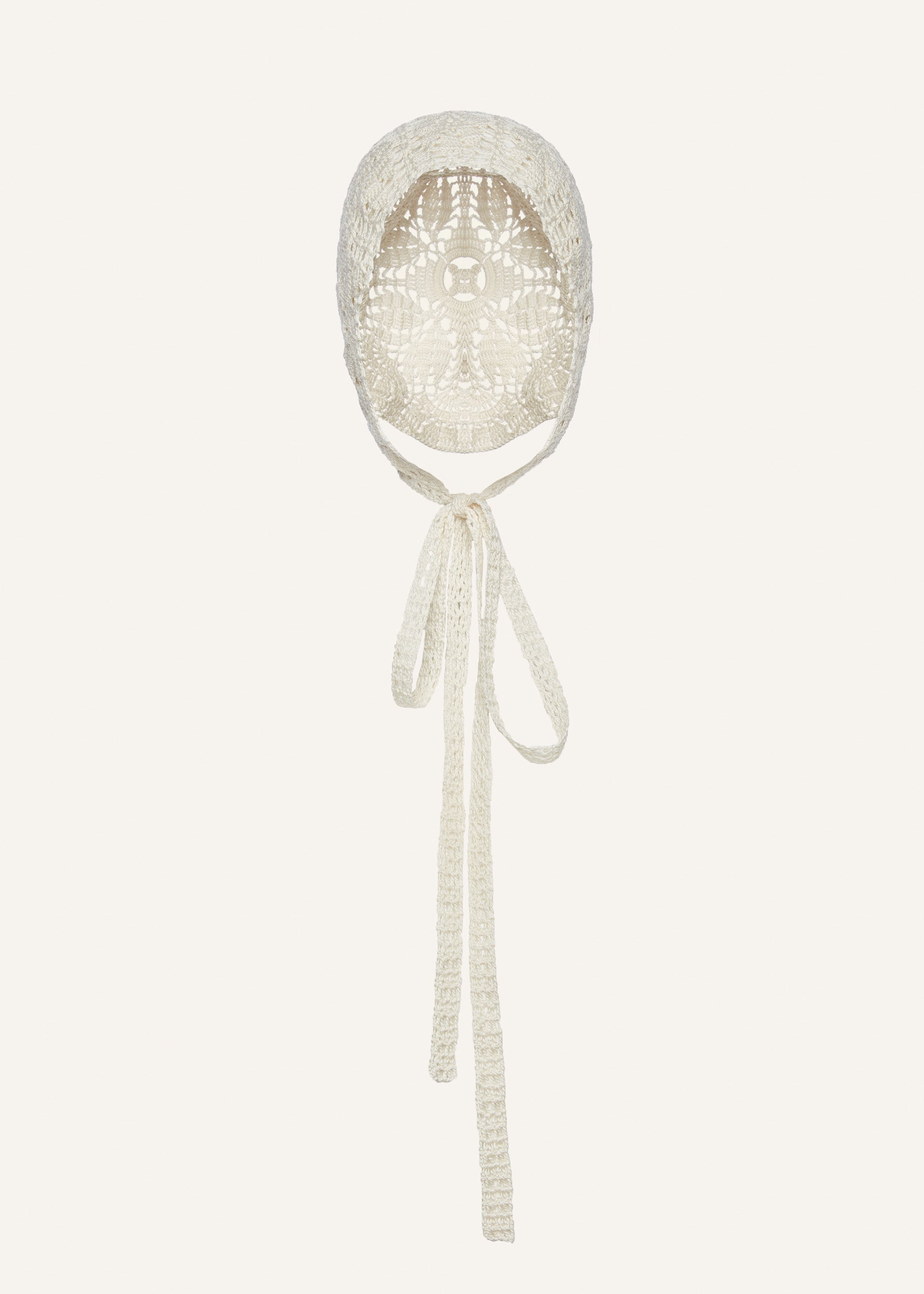 Crochet bonnet in cream - 1