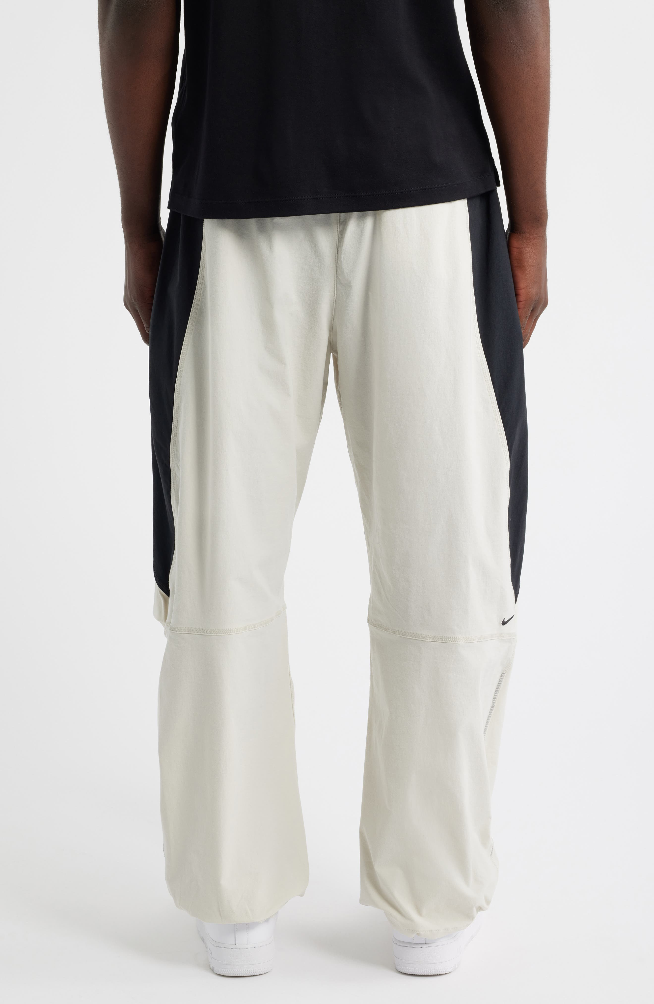 Nike Tech Dri-FIT Woven Oversize Stretch Nylon Pants in Light Bone/Black at Nordstrom - 2