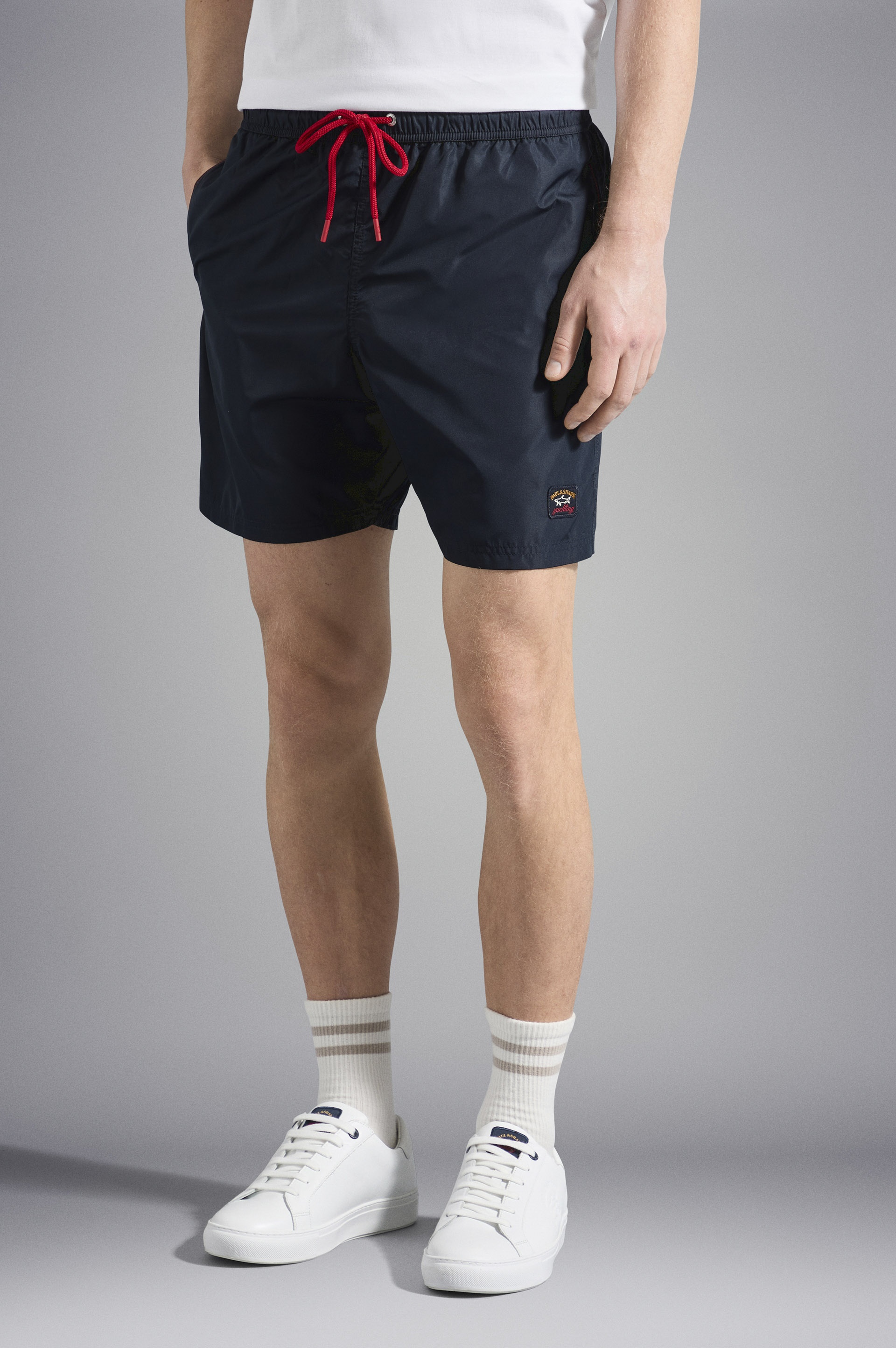 SWIM SHORTS WITH ICONIC BADGE - 6