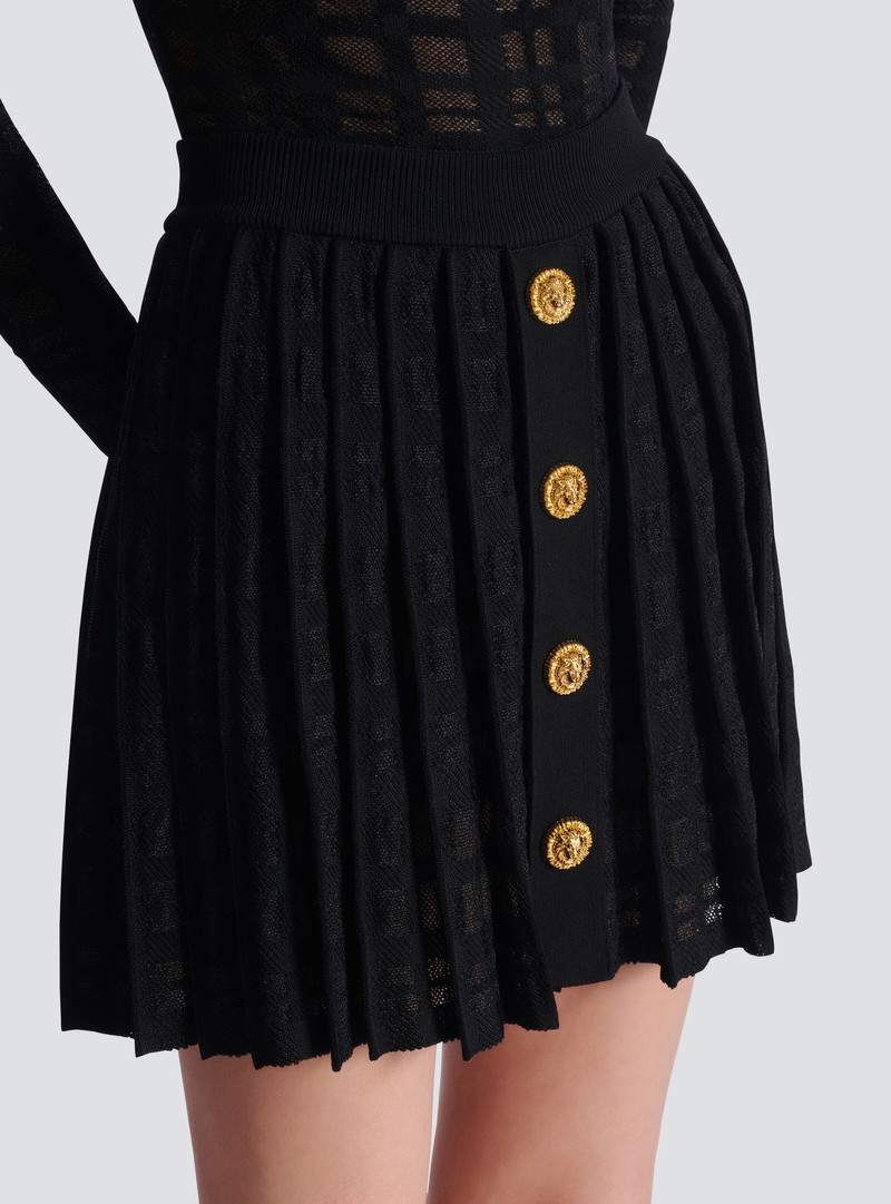 Short pleated skirt in plaid knit 7