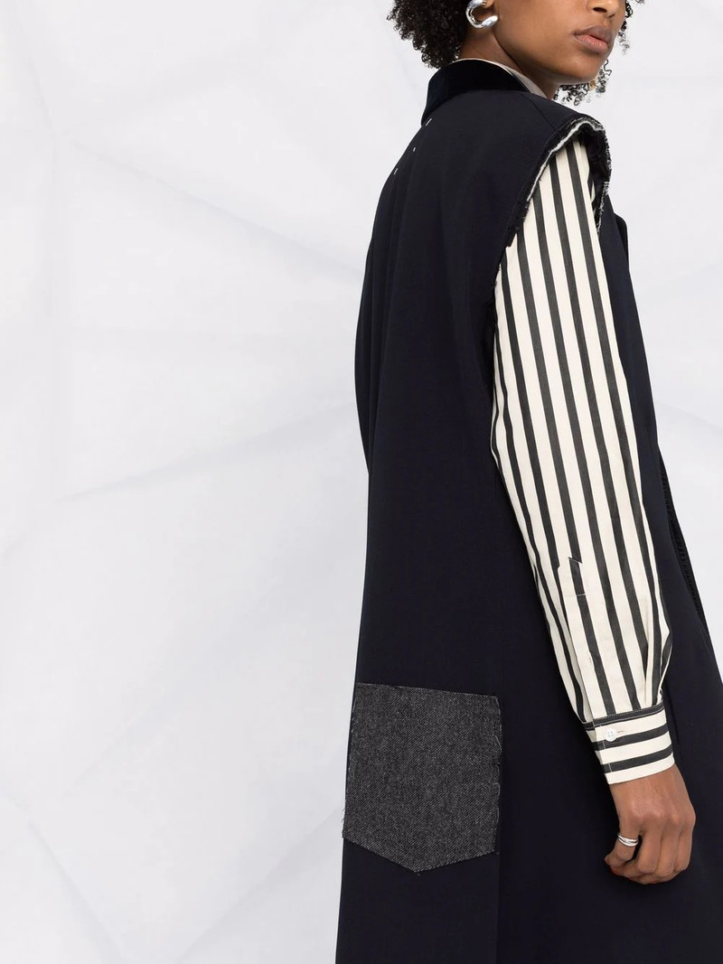 sleeveless raw-cut coat 5