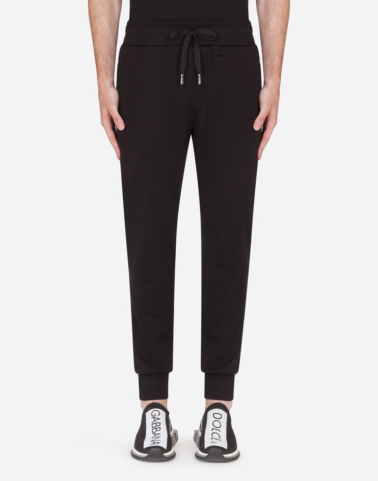 Jersey jogging pants with embroidery - 1