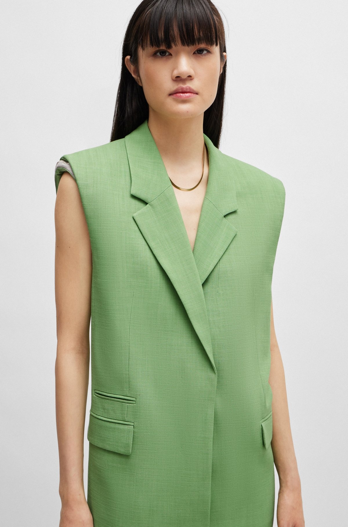 SLEEVELESS JACKET WITH CONCEALED CLOSURE AND SIGNATURE LINING - 5
