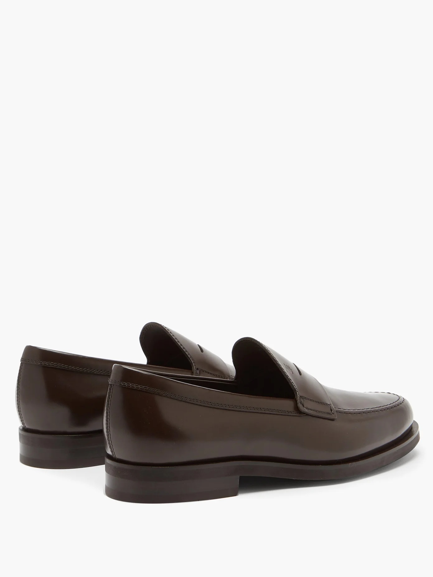 Logo-debossed leather penny loafers - 4