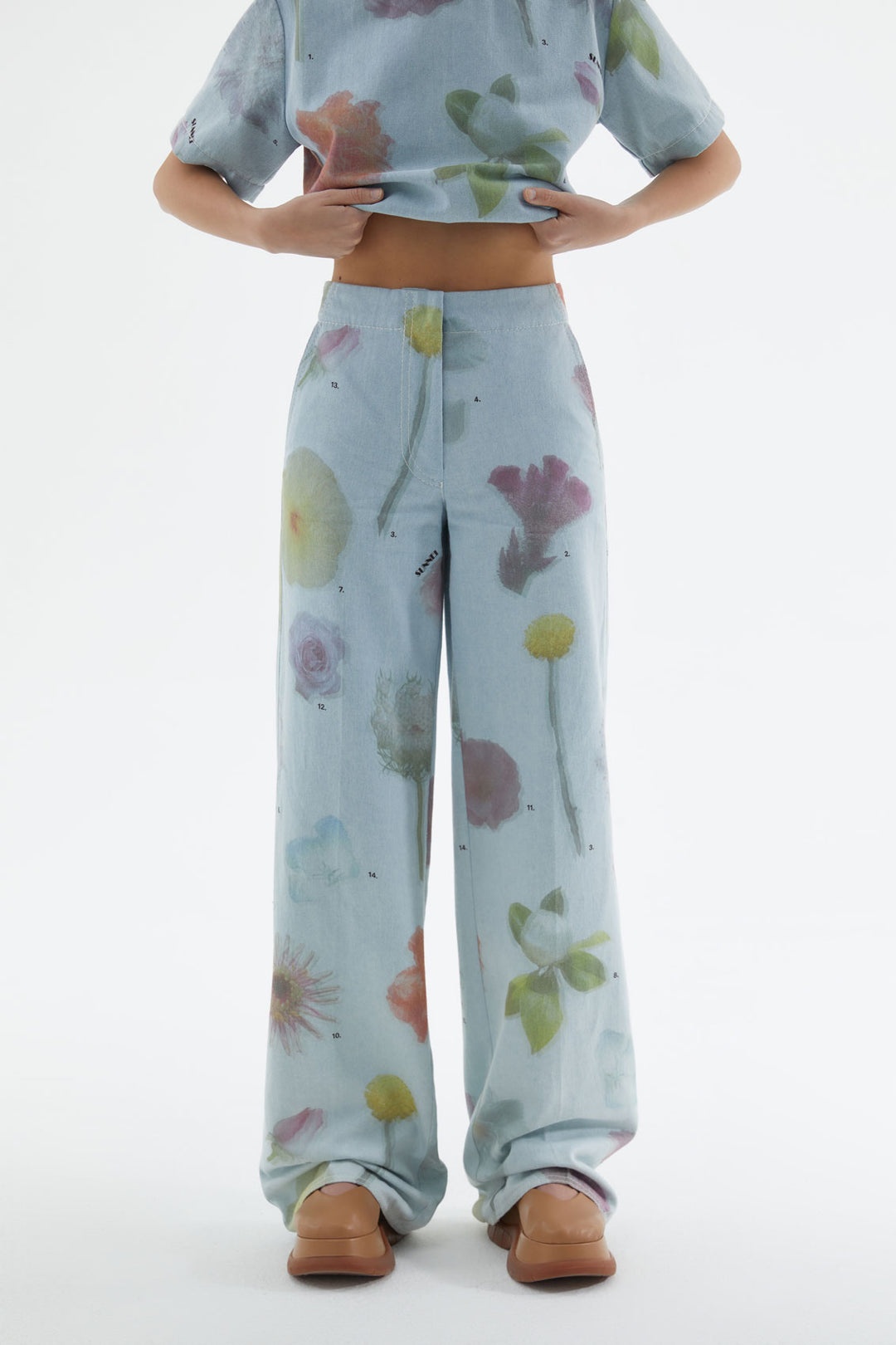 DENIM PANTS WITH FLOWER PRINT - 1
