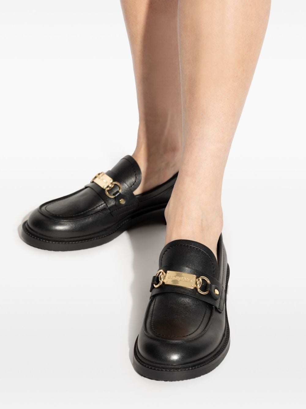 logo-engraved leather loafers - 6
