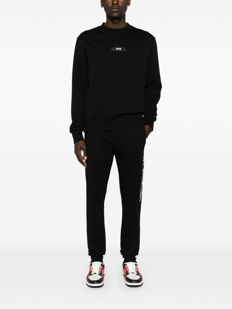 VERSACE JEANS COUTURE logo-patch cotton track pants outlook