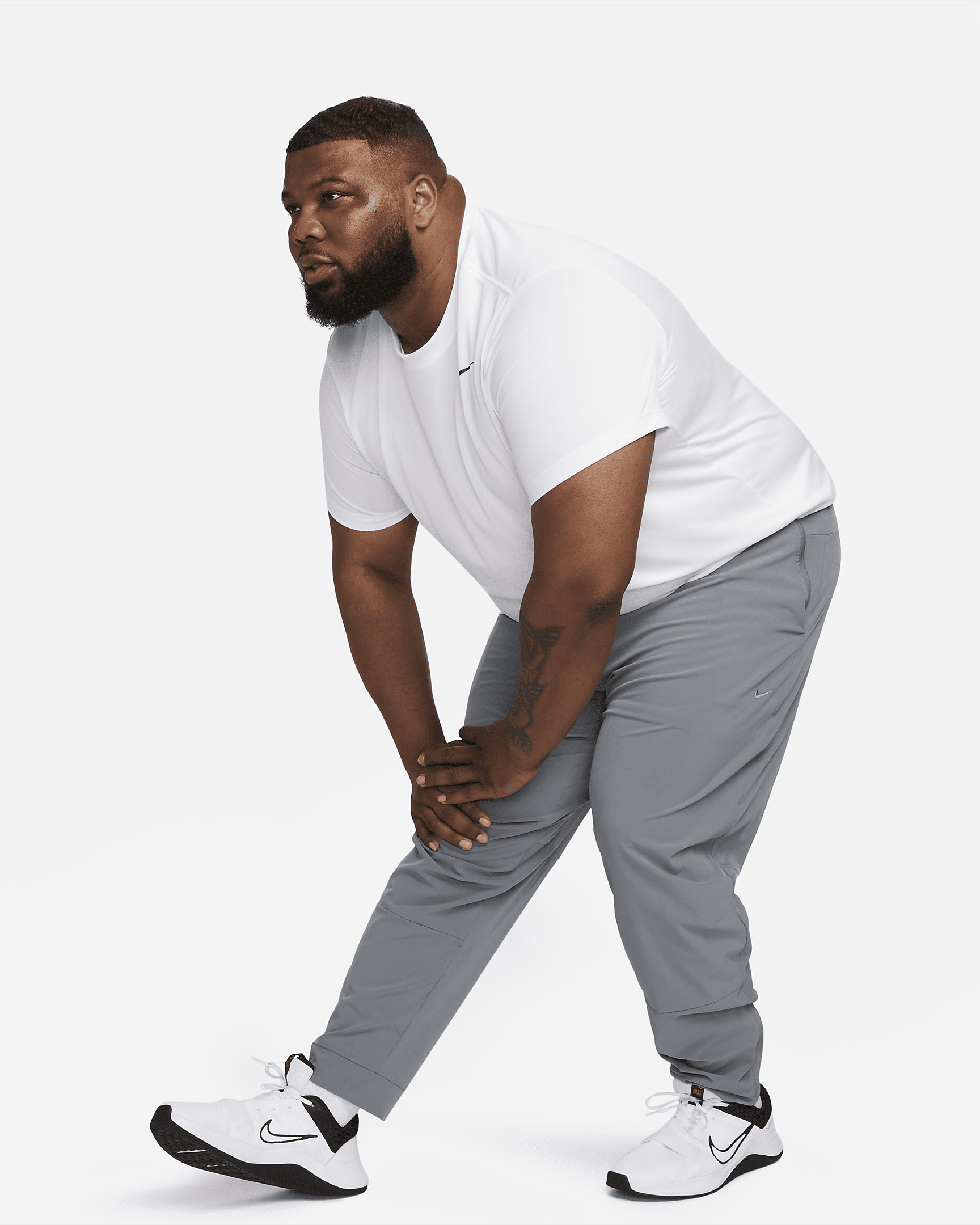 Nike Unlimited Men's Dri-FIT Zippered Cuff Versatile Pants - 12