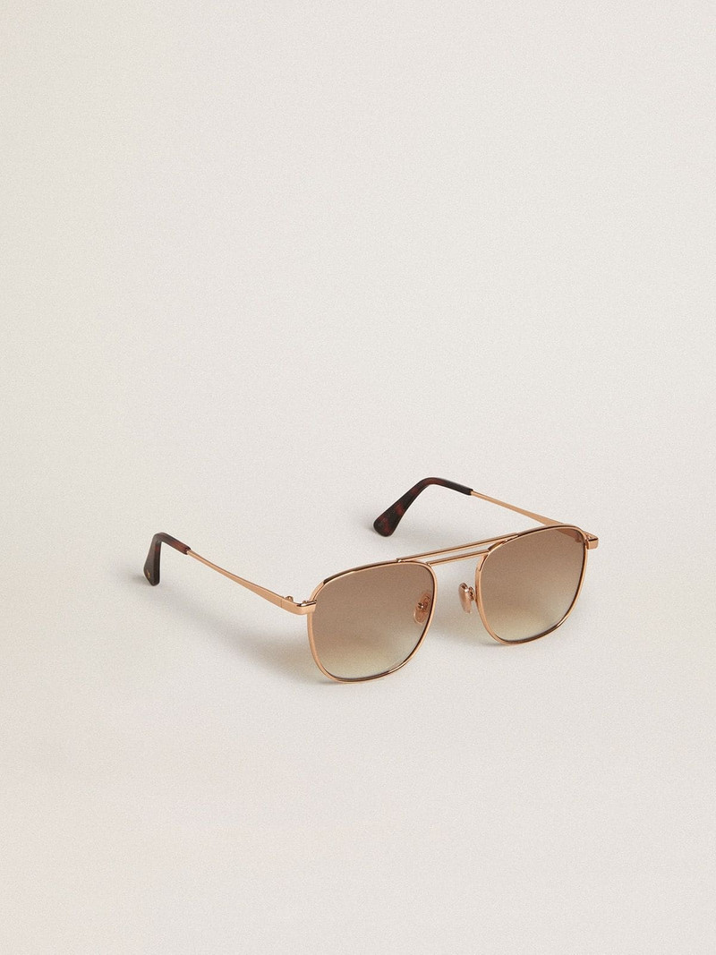 Aviator-style sunglasses with gold frame and beige lenses 1