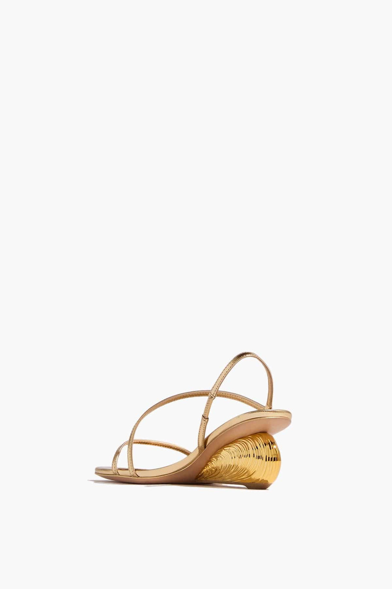 SIMKHAI Bridget Oyster Shell Wedge Sandal in Gold outlook