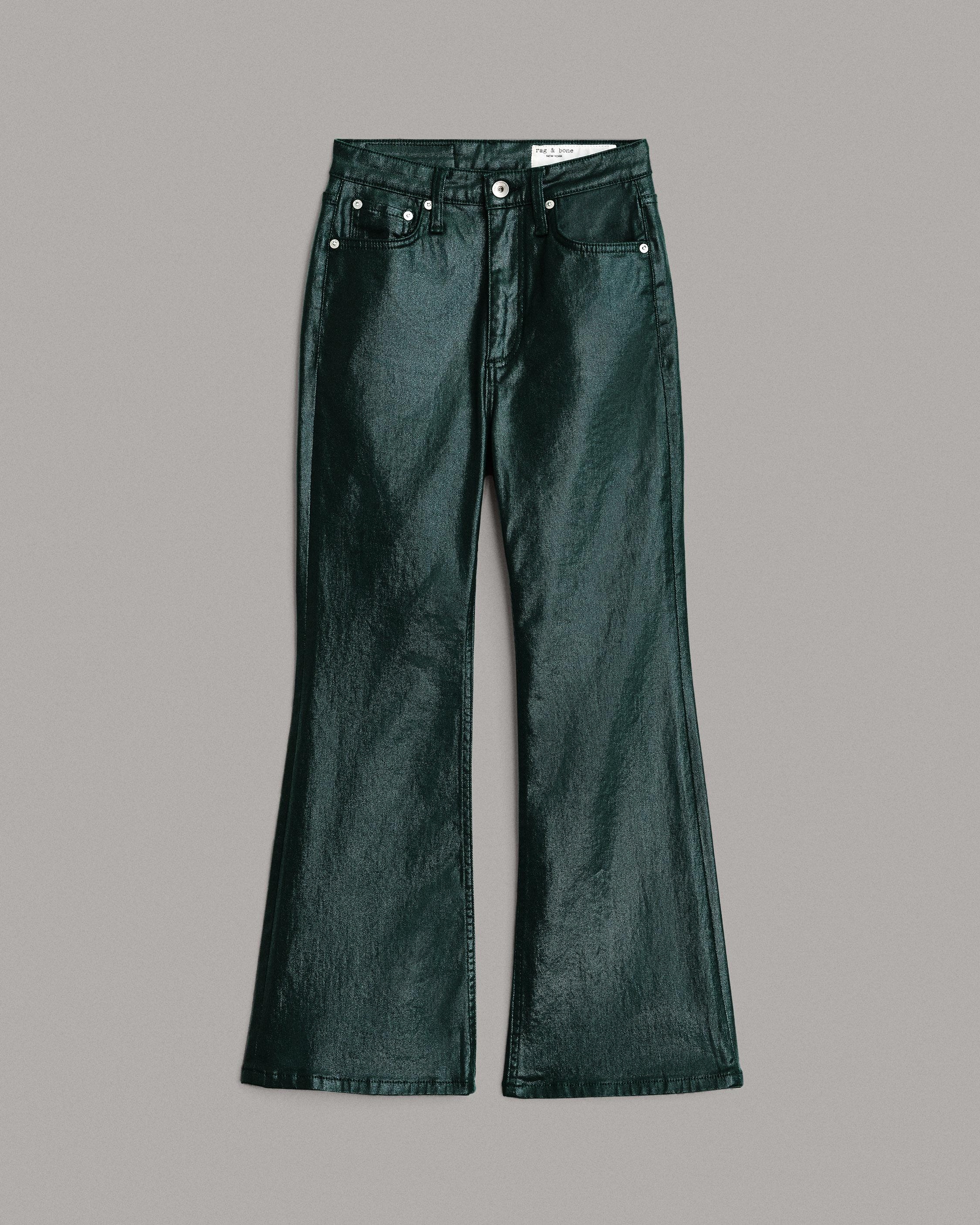Casey High-Rise Ankle Flare - Coated Pine Grove
Slim Fit Green Wash Jean - 1