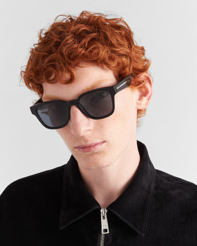 Prada Sunglasses with iconic metal plaque outlook