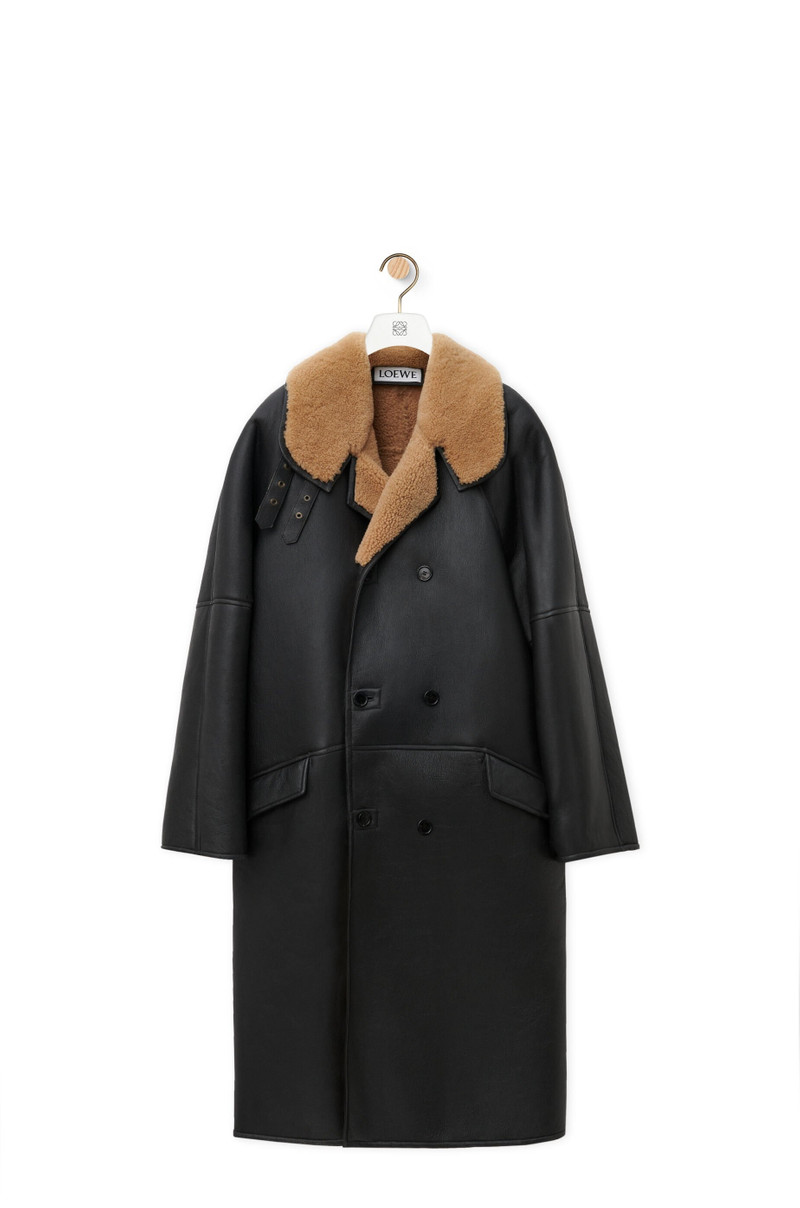Double-breasted coat in shearling 1