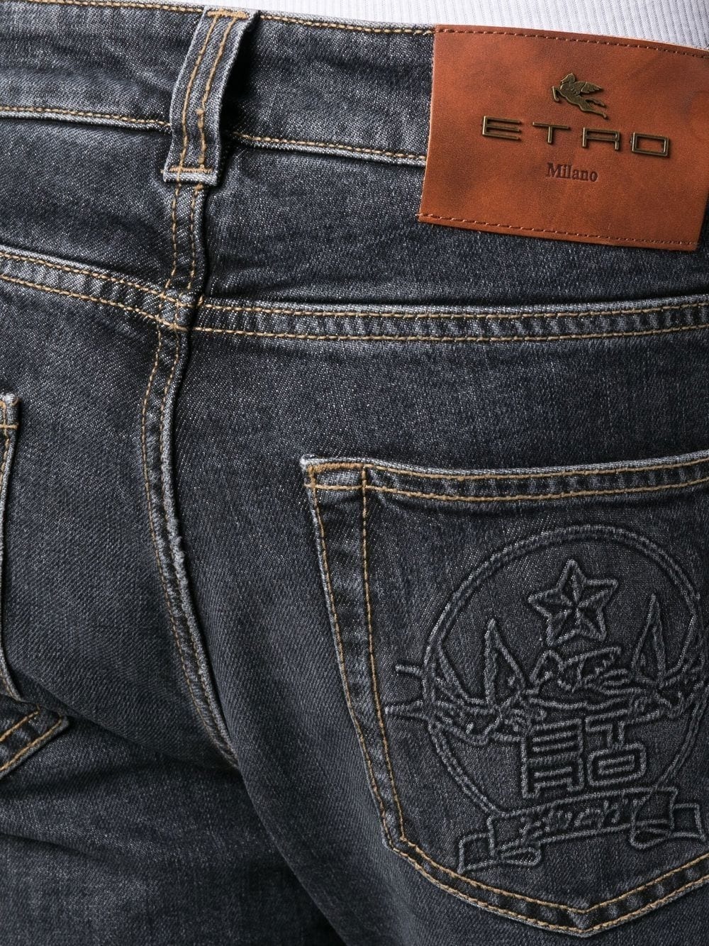 logo-embossed slim-cut jeans - 5