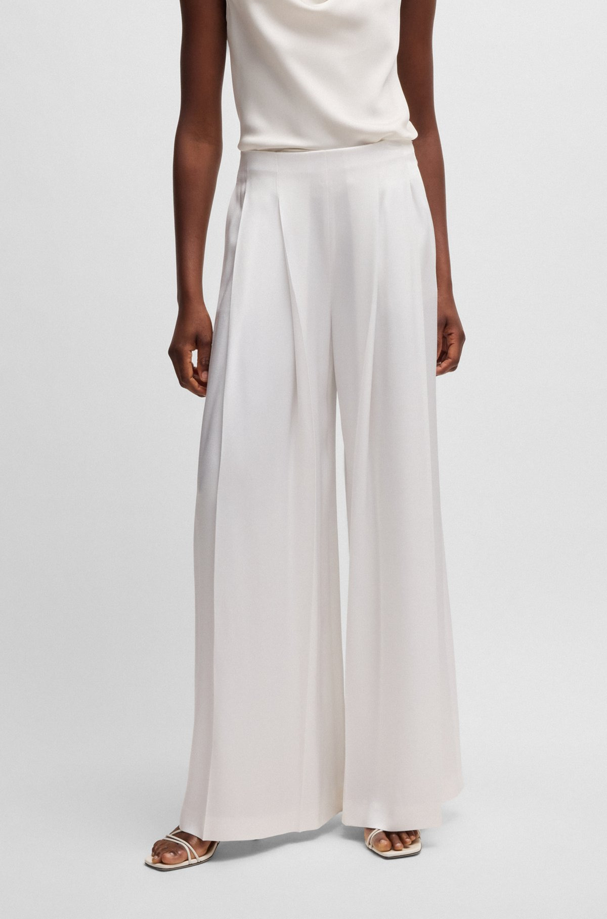RELAXED-FIT TROUSERS WITH FRONT PLEATS - 2