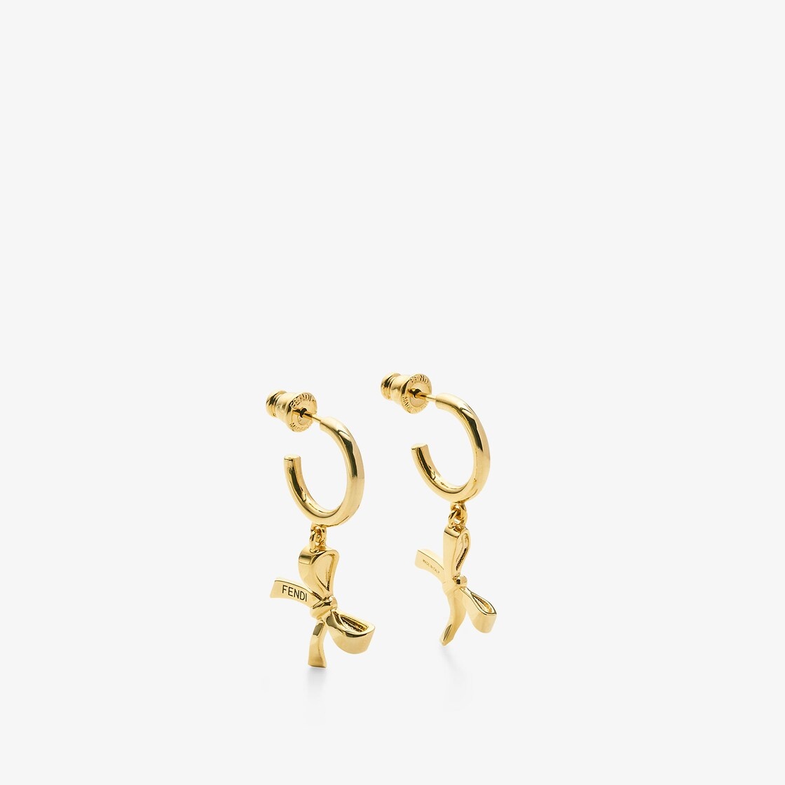 Hoop earrings with bow-shaped pendant. Made of metal with a gold finish. Decorated with Fendi letter - 1