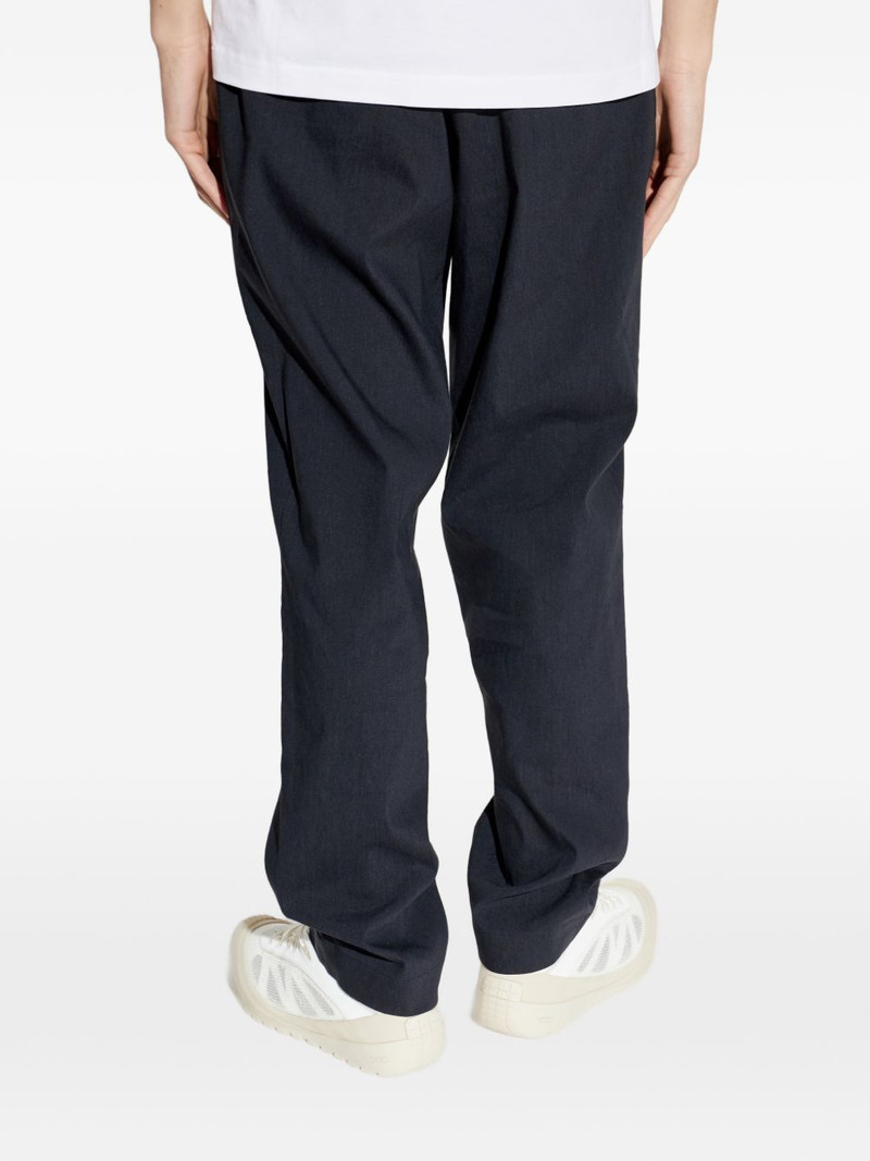 Technical logo-patch linen trousers 4