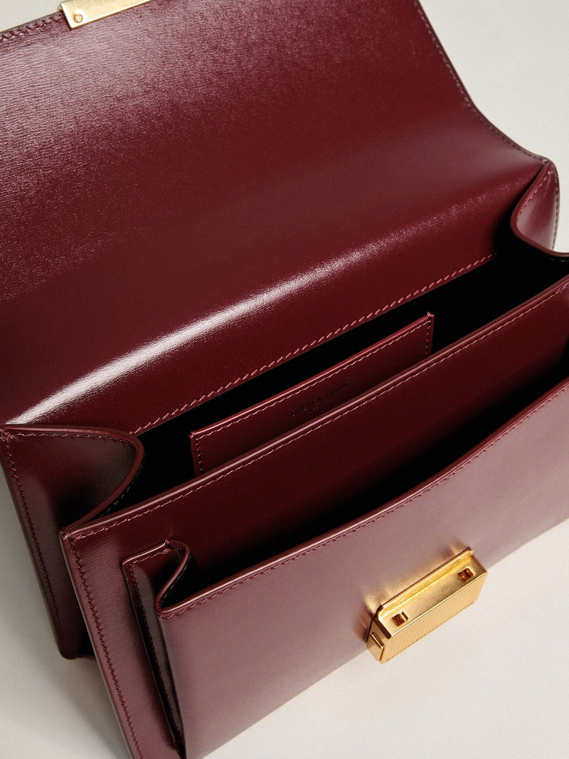 Venezia Bag in burgundy boarded leather with gold details 7