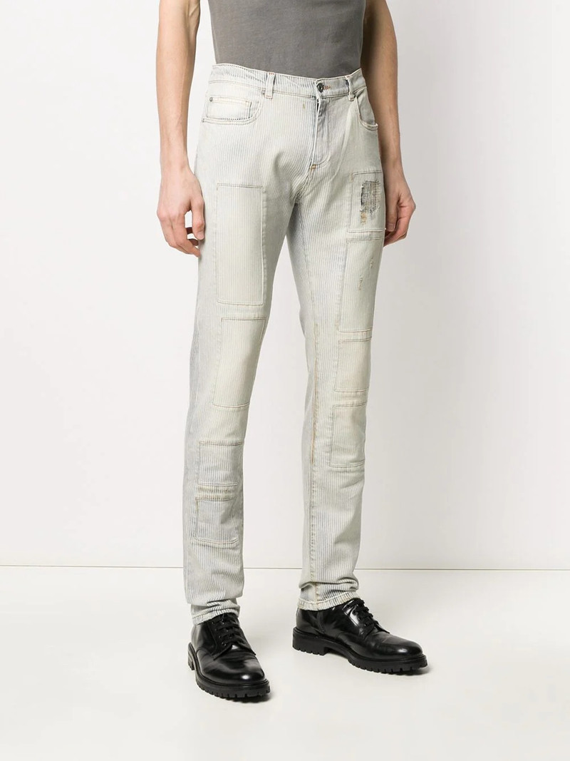 slim-fit stonewashed jeans 3