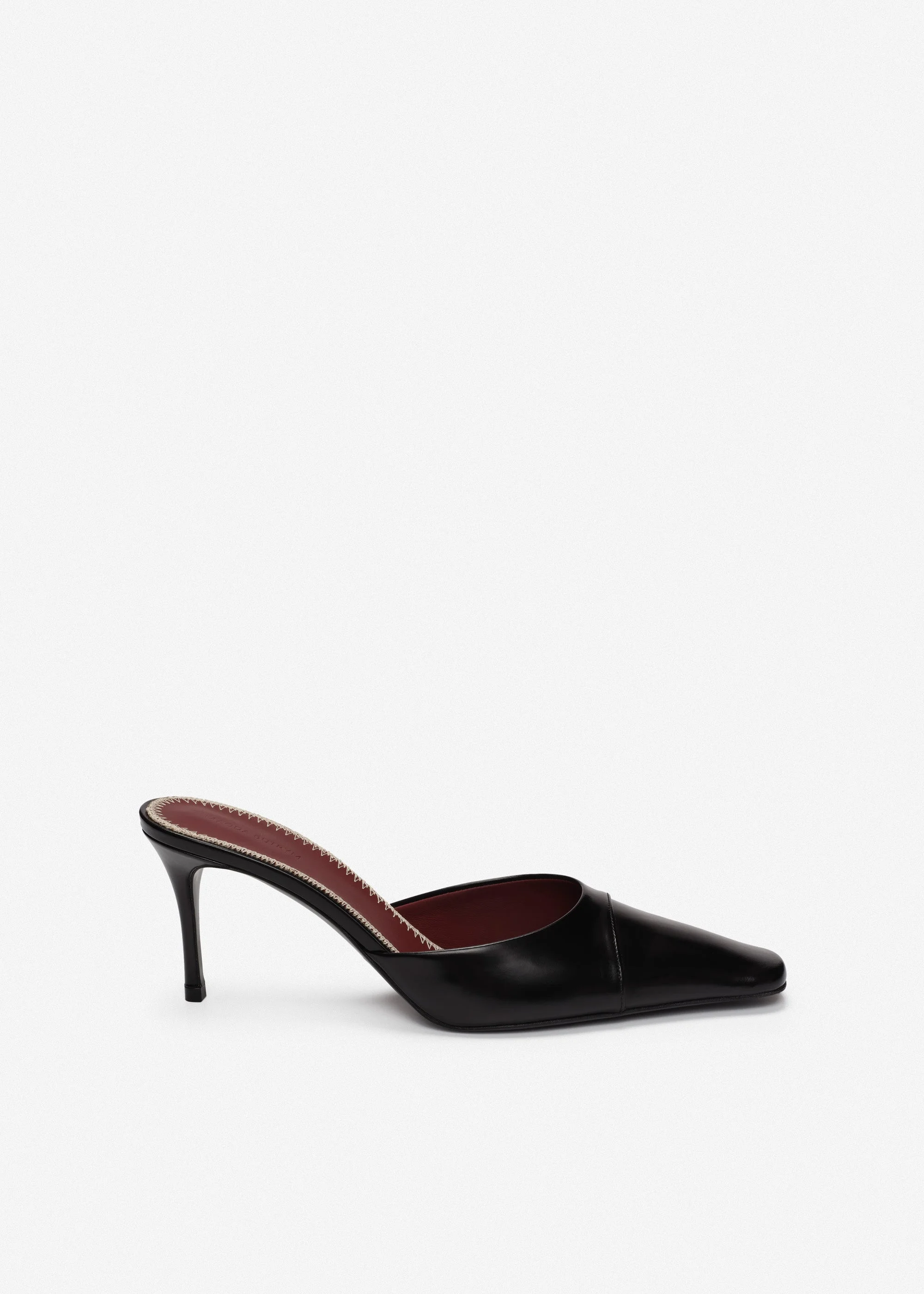 Pointed-toe mules in black leather - 1