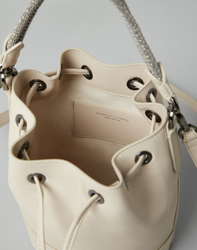 Calfskin bucket bag with precious braided handle 5