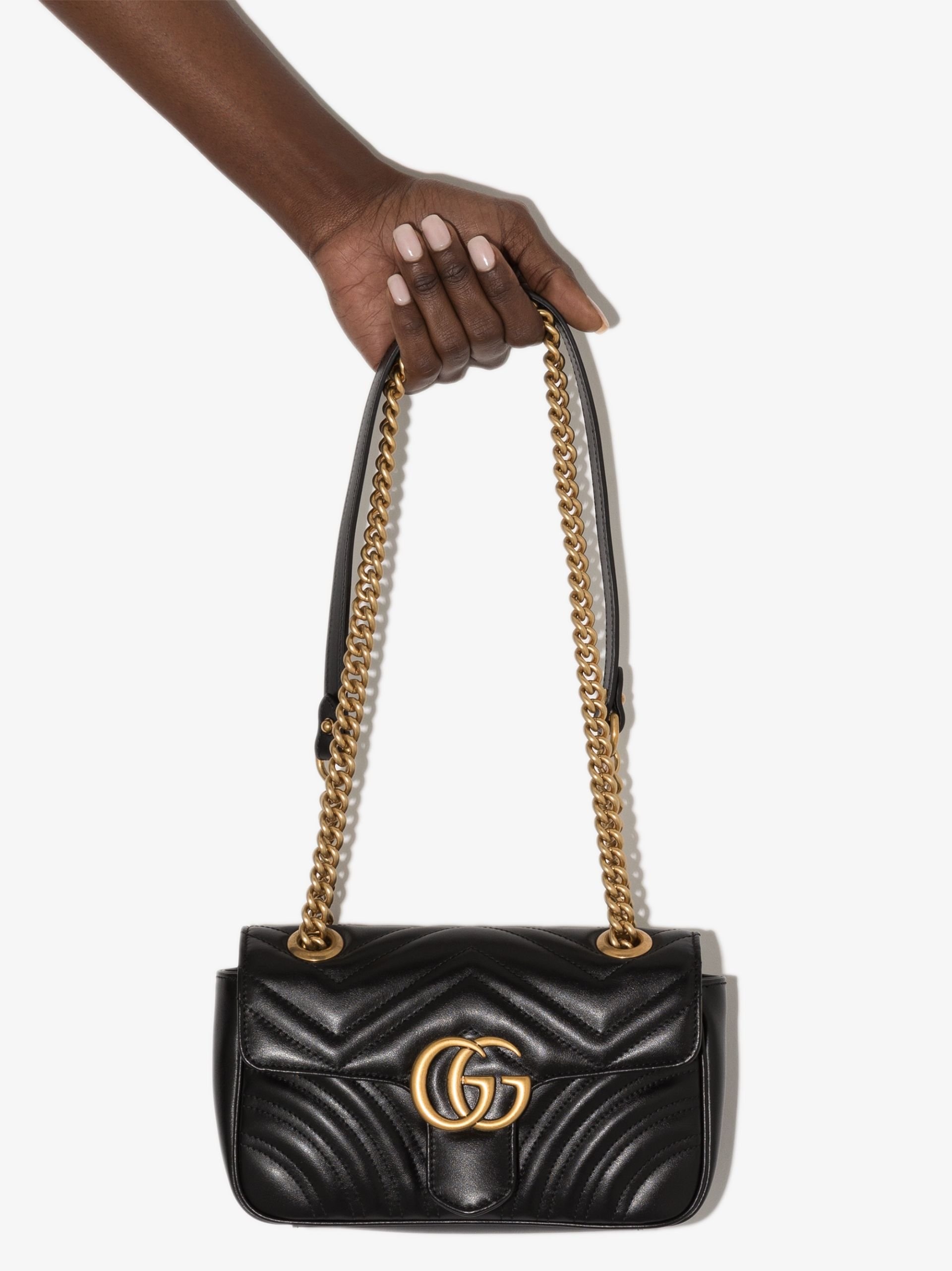 GUCCI black GG Marmont matelassé mini bag | brownsfashion GUCCI black GG Marmont matelassé mini bag | brownsfashion