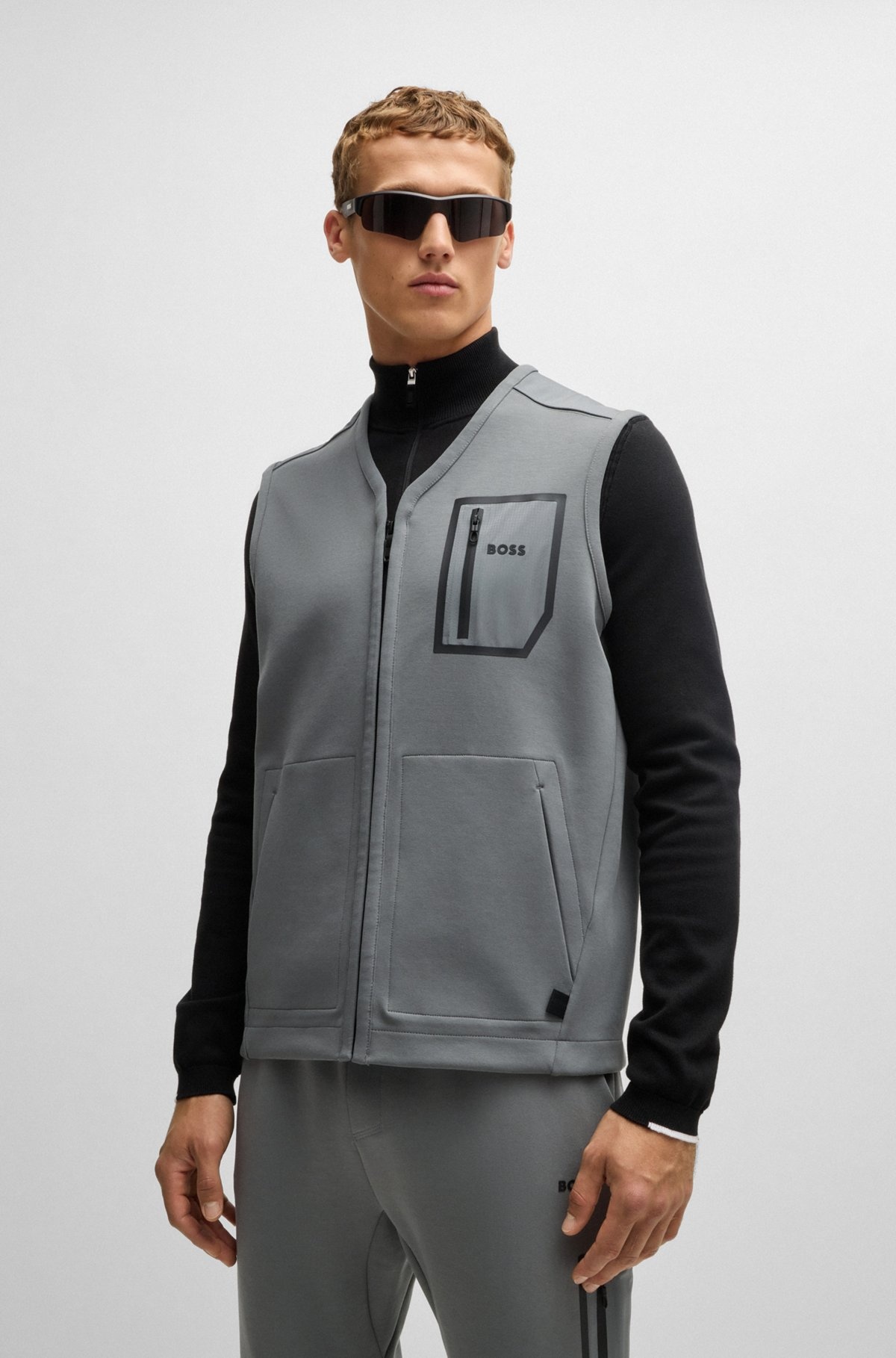 GILET WITH DECORATIVE REFLECTIVE LOGO - 2
