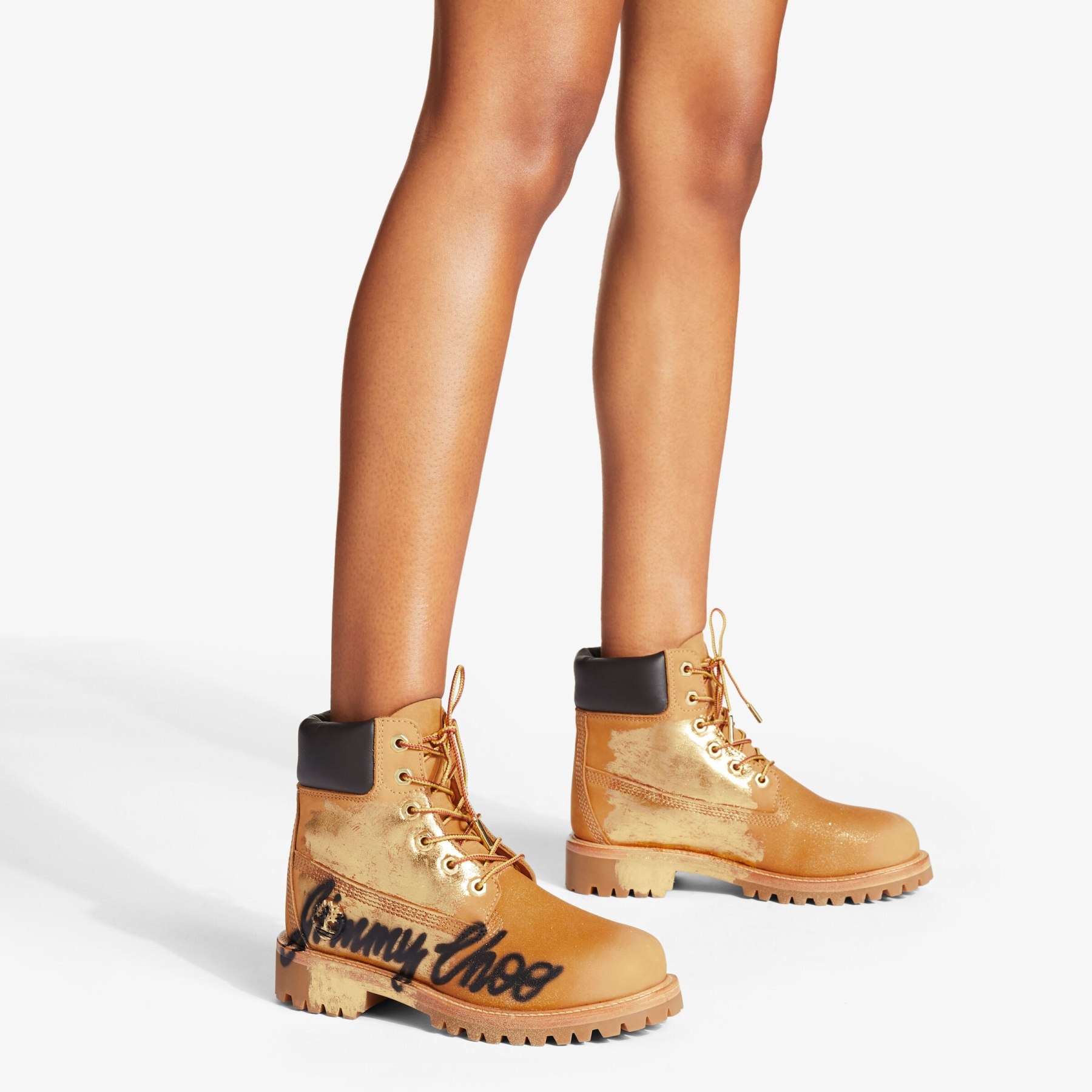 JIMMY CHOO X TIMBERLAND 6 INCH GRAFFITI BOOT
Wheat Timberland Nubuck Ankle Boots with Jimmy Choo Gra - 2