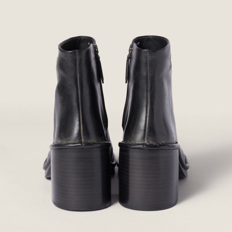 Miu Miu Leather booties outlook