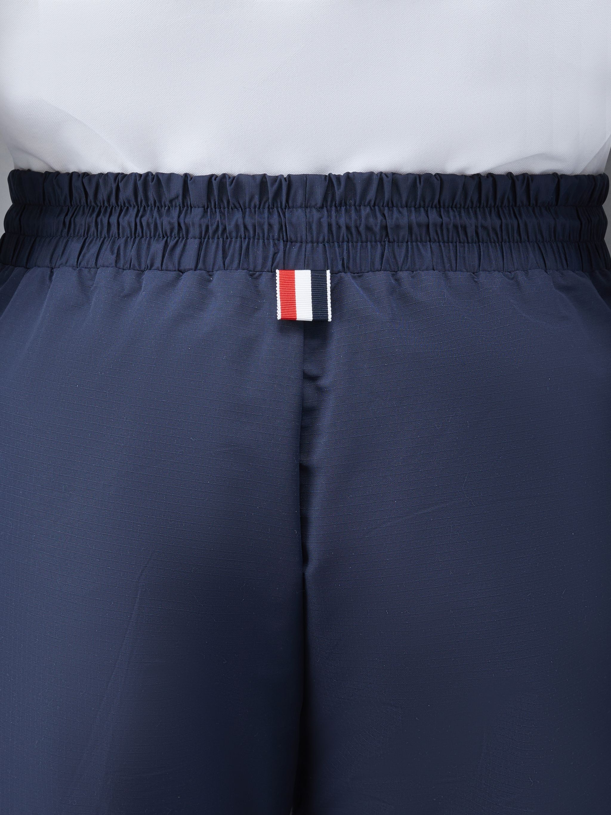 【THOM BROWNE】Plain Weave 4 Bar Elastic Track Pants Thom Browne - Plain Weave 4 Bar Pleated Mini Skirt | HBX