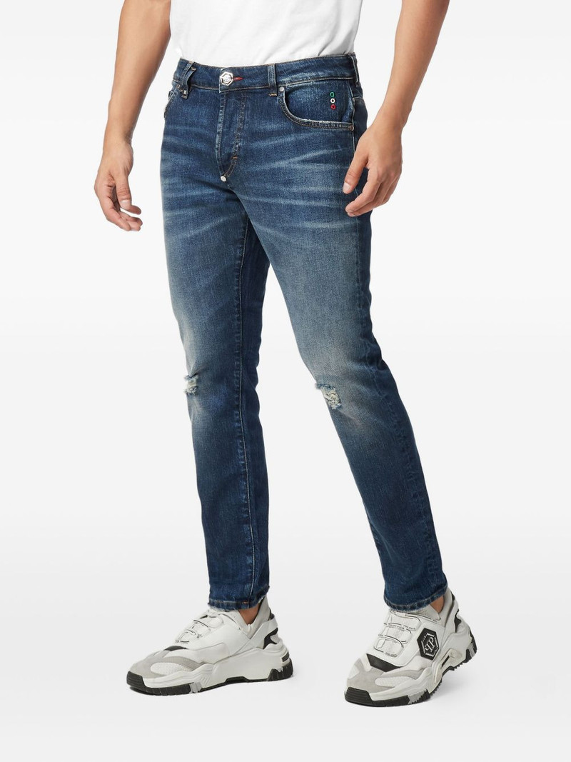 PHILIPP PLEIN distressed logo-plaque jeans outlook