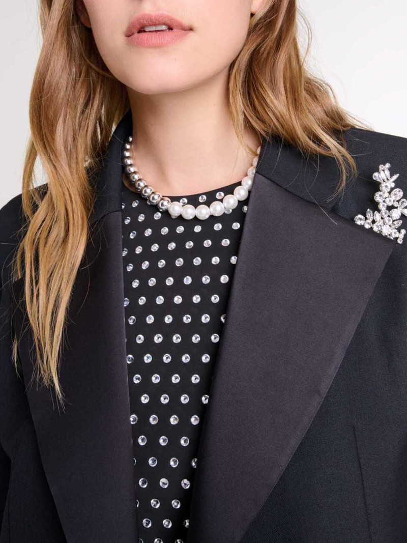Suit jacket with brooch 6