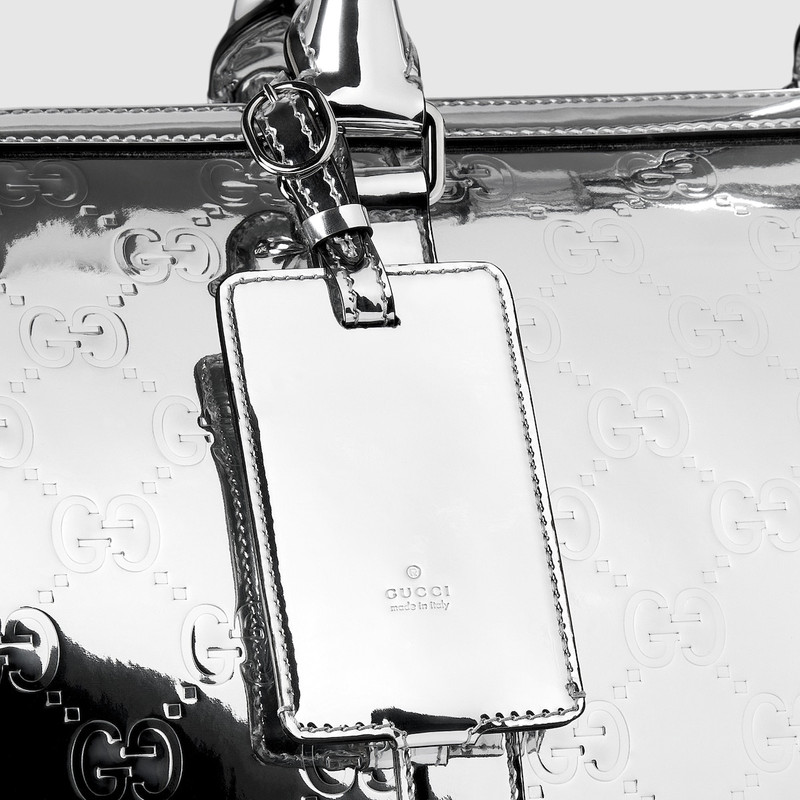 Medium embossed GG duffle bag 3