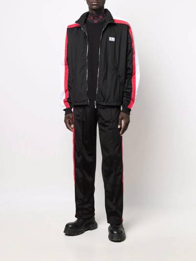 VETEMENTS logo-patch track jacket outlook