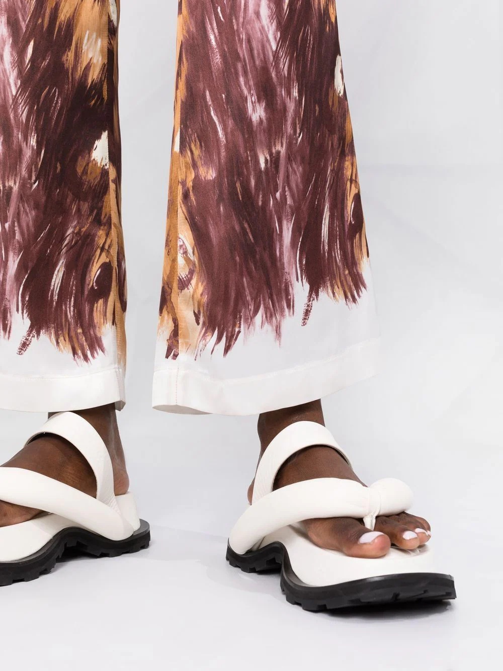 graphic-print flared trousers - 5